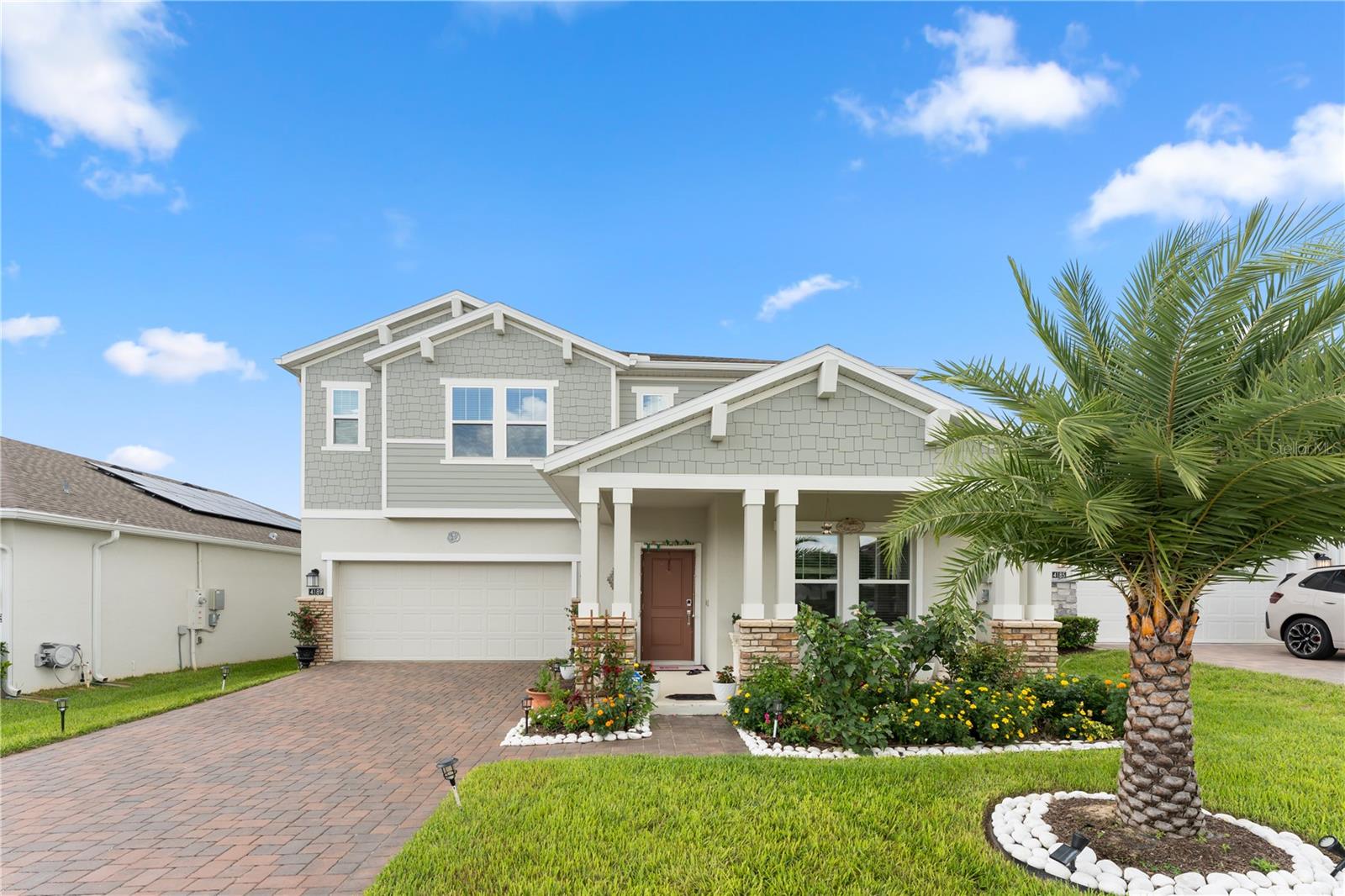 Nearly New Luxury Living in Apopka. Get in Early on Wyld Oaks! Welcome to this stunning, better than new 2 year old home offering 5 bedrooms, a versatile loft, and a dedicated office. Perfect for growing families or remote work flexibility. The open floor plan is flooded with natural light and flows effortlessly from the main living space into a screened in porch, where you can unwind while watching the horses in the neighboring farm, a peaceful, pastoral view that's increasingly rare to find so close to city conveniences.
Thoughtfully upgraded throughout, this home features durable luxury vinyl plank flooring, gutters for added protection, and a whole house water softener. Car and hobby enthusiasts will love the tandem 3-car garage with a sleek epoxy coated floor, plus UV lights installed on the A/C system for improved air quality. A unique wet bar has been added to the downstairs bedroom, creating an ideal in-law or guest suite setup. Residents also enjoy access to a community pool.
Location is everything, this home sits directly across from Wyld Oaks, the 215+ acre master-planned mixed-use development bringing retail, dining, entertainment, offices, and thousands of new residences to Northwest Orange County over the coming years. Get in now, at the very beginning of this area's growth trajectory, and watch your investment appreciate as Wyld Oaks comes to life right outside your door.
Commuters will appreciate being just 1 mile from the 429 Expressway, with easy access throughout Central Florida, and only 18 minutes to charming Downtown Mount Dora.
Don't miss this rare opportunity to own a move in ready, upgraded home with country charm and city convenience, in one of Apopka's fastest growing corridors! Schedule your showing today!