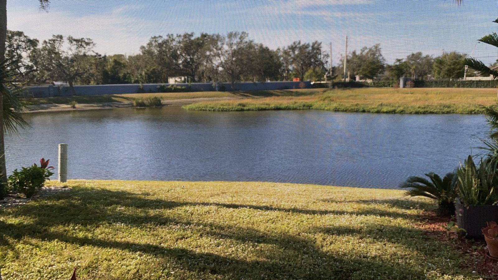 Welcome to this beautifully maintained Key West-style townhome located in the highly desirable gated community of Sabal Key. Offering 2 bedrooms, 2.5 bathrooms, and serene pond views, this home delivers the perfect blend of comfort, style, and easy Florida living. Not in a flood zone, pets are welcome, short term rental allowed and sold fully furnished.

Step inside to a spacious open-concept living and dining area featuring luxury vinyl flooring and a functional L-shaped layout designed for both everyday living and entertaining. Large sliding glass doors fill the space with natural light and lead to the screened lanai, where tranquil water views create the perfect backdrop for morning coffee, evening wine, or simply unwinding after a long day. An additional outdoor storage closet adds extra convenience.

Upstairs, soaring vaulted ceilings enhance the bright and airy feel of the home, while the thoughtfully designed split layout provides privacy by separating the bedrooms from the main living areas below.

Residents of Sabal Key enjoy the peace of mind of gated access, assigned parking, and ample guest parking. The community also features resort-style amenities including a sparkling pool, playground, tennis courts, and basketball court.

The HOA fee covers water, trash, lawn care, exterior maintenance, and roof upkeep, making ownership truly low maintenance. Roofs were replaced in 2022, adding even more long-term value and peace of mind.

Whether you're looking for a full-time residence, seasonal retreat, or income-producing investment property, this townhome is an exceptional opportunity. With no rental restrictions, the possibilities are endless. The unit is sold fully furnished.

Schedule your private showing today and experience the charm and lifestyle Sabal Key has to offer.
