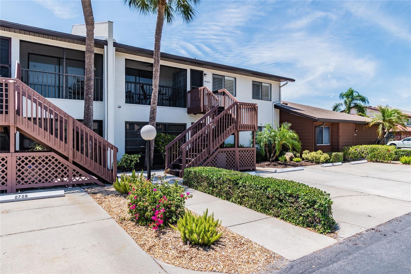 Welcome home to easy, sun-filled living in the heart of West Bradenton's sought-after Country Village — a friendly 55+ community where every day feels like a getaway. This beautifully maintained 2-bedroom, 2-bath residence offers an open-concept layout designed for comfort and connection, where gleaming quartz countertops and stainless steel appliances make the kitchen a joy to gather in. The thoughtful split floor plan gives you and your guests privacy, while a spacious primary suite with a walk-in closet and built-in organizers keeps everything effortlessly in its place. Step out to your screened lanai — the perfect spot for morning coffee or unwinding as the Florida evening rolls in. Beyond your front door, resort-style amenities await: a heated community pool and spa, an inviting clubhouse, tennis courts, and a lively social calendar that makes it easy to meet neighbors and make friends. Ideally located just minutes from the powdery sands of Anna Maria Island, Robinson Preserve, shopping, dining, and top-rated healthcare, this move-in-ready gem offers the relaxed, low-maintenance Florida lifestyle you've been dreaming of. Come see why so many are proud to call Country Village home!