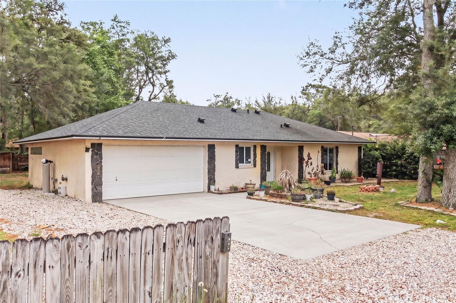 One or more photo(s) has been virtually staged. This corner lot property is ideally located just minutes from the World-Famous Daytona Beach and less than an hour to Orlando, offering strong upside for investors or buyers ready to bring their vision to life with great potential!
The home features an open floor plan with a kitchen that overlooks the living and dining areas. With solid bones and a functional layout, this property is ready for updates and improvements to maximize its value.
Spacious bedrooms, including a primary suite with a walk-in closet, provide a great foundation for renovation. The large backyard with chicken coop, wide driveway, and detached utility shed offer additional flexibility and storage. No HOA adds to the appeal.
Surrounded by mature trees in a convenient location near shopping, dining, and major roadways, this property is a prime opportunity for a rental, or personal project. Bring your contractor and imagination—this one is ready for transformation!