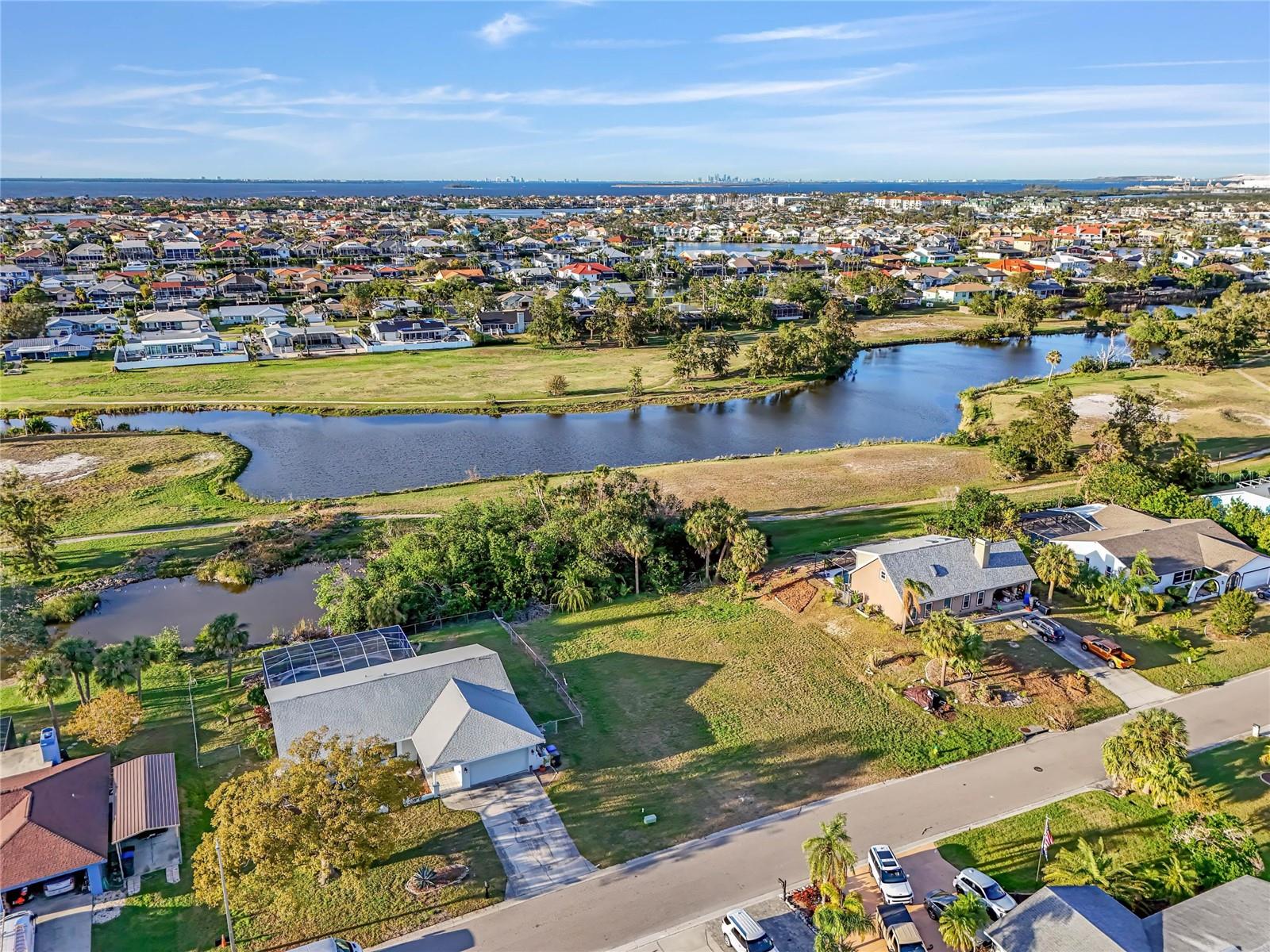 Future site of your Dream Home!!! Located in the heart of Apollo Beach near the Apollo Beach park and rec center. This lot sits high and is located on the golf course. Enjoy Florida living with easy access to the Apollo Beach Preserve and boat ramp just minutes away. This community has NO HOA and lot is clear and ready to build. Floorplan and designs available from build team of HGTV "100 Day Dream Home"!