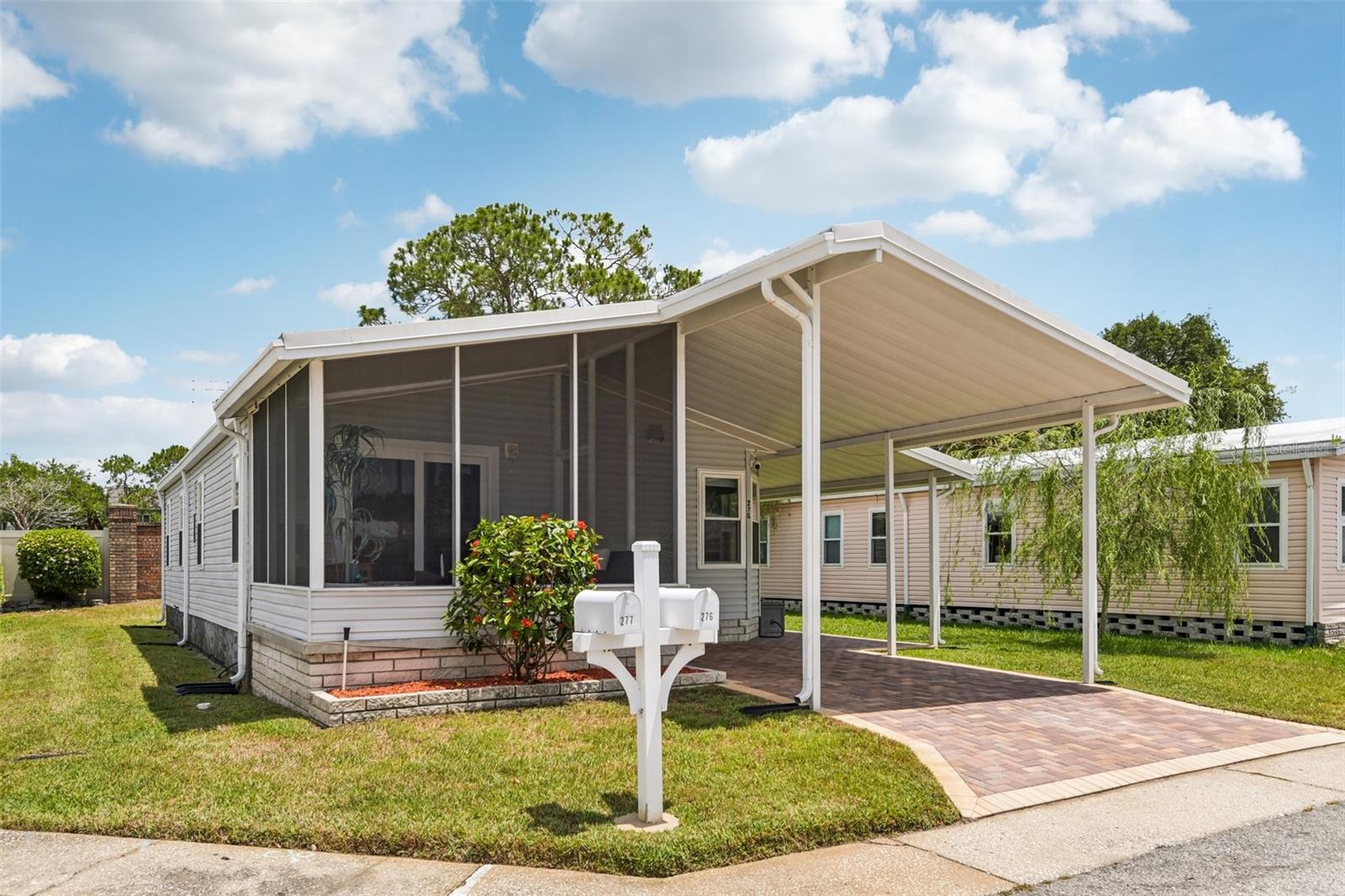 Welcome to effortless Florida living in this beautifully updated, move-in-ready 2-bedroom, 2-bath home located in one of Oldsmar’s most desirable 55+ active adult communities. From the moment you arrive, the pride of ownership is clear. Charming curb appeal, an oversized screened front porch, and a meticulously maintained exterior create the perfect first impression and set the tone for the easy, low-maintenance lifestyle so many active adults and seasonal residents are looking for. Step inside and you’ll immediately notice the thoughtful updates throughout. The true heart of the home is the stunning custom kitchen, designed for both everyday living and entertaining. It features elegant quartz countertops, a farmhouse sink, designer tile backsplash, premium custom cabinetry with dovetail soft-close drawers, and new Kitchen and Laundry flooring. This is a space that’s as beautiful as it is functional. The rest of the home is equally impressive, with upscale finishes including LED recessed puck lighting, crown molding, 2¼-inch baseboards, custom closet systems, and beautiful Bali Blinds that add both style and functionality throughout. The Primary and guest bathroom has also been tastefully renovated, and every room feels bright, welcoming, and exceptionally well cared for. Beyond the cosmetic updates, this home offers true peace of mind with major improvements already completed, including a newer roof (2017), A/C system (2014) with UV light added in 2020, energy-efficient double-pane windows (2014), an upgraded electrical panel with whole-home surge protection, and gutters with gutter guards. A standout feature is the upgraded marine-grade plywood subfloor, a rare detail that speaks to the level of care and quality invested in this home. The lifestyle here is just as appealing. Residents enjoy resort-style amenities with low HOA fees that include a heated pool and spa, clubhouse, library, billiards room, shuffleboard, bocce ball court, and separate men’s and women’s saunas. Boat and RV storage are also available for added convenience. The location is hard to beat. Situated in the heart of Oldsmar, directly across from shopping, dining, banking, entertainment, and everyday conveniences, you’re also just a short drive to Westfield Countryside Mall, Tampa International Airport, scenic parks, Safety Harbor, downtown Tampa, Clearwater, and the world-famous Gulf beaches. This turnkey 55+ retreat offers the perfect combination of comfort, convenience, and carefree Florida living. Schedule your private showing today.