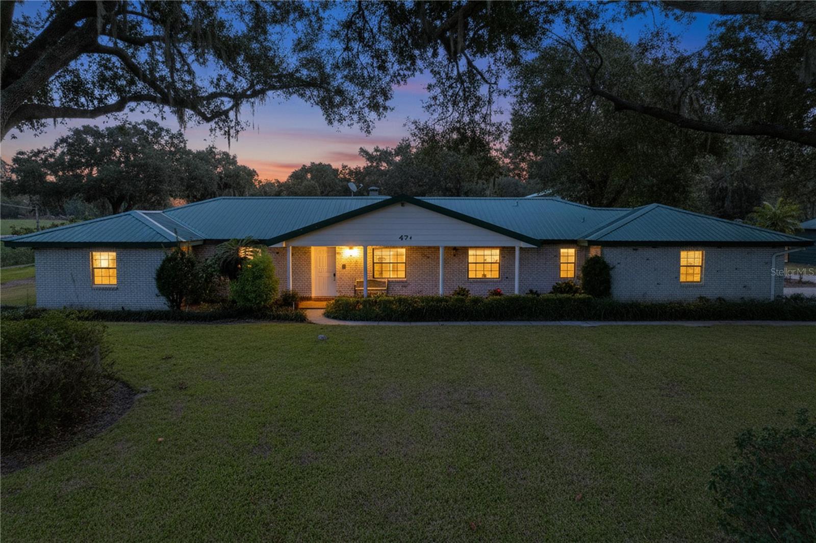 Welcome to your own slice of Florida paradise. This enchanting 10-acre estate features a lovingly maintained 4-bedroom, 3-bath home where comfort meets charm. Thoughtfully cared for, the home offers a durable metal roof and a newer A/C system (approximately 2 years old), ensuring both beauty and peace of mind.

Acreage surrounds the home, with a portion of the land currently dedicated to horses—perfect for equestrian living, hobby farming, or simply enjoying wide-open spaces and endless skies. Whether you envision a thriving farm, a family compound, or future development opportunities, these 10 acres invite you to dream without limits.

Adding to the property’s appeal is an expansive two-story concrete workshop, ideal for creatives, collectors, or anyone needing generous space for projects and toys. A barn also graces the land, offering character and the opportunity for restoration following some storm damage.

Tucked away in peaceful privacy yet wonderfully connected, this retreat is conveniently located near Tampa and Orlando, with Florida’s sun-kissed beaches just a short drive away. Enjoy the rare balance of tranquil country living with easy access to world-class dining, entertainment, and coastal adventures.

This is more than a property—it’s a lifestyle, a legacy, and a place where memories are waiting to be made.