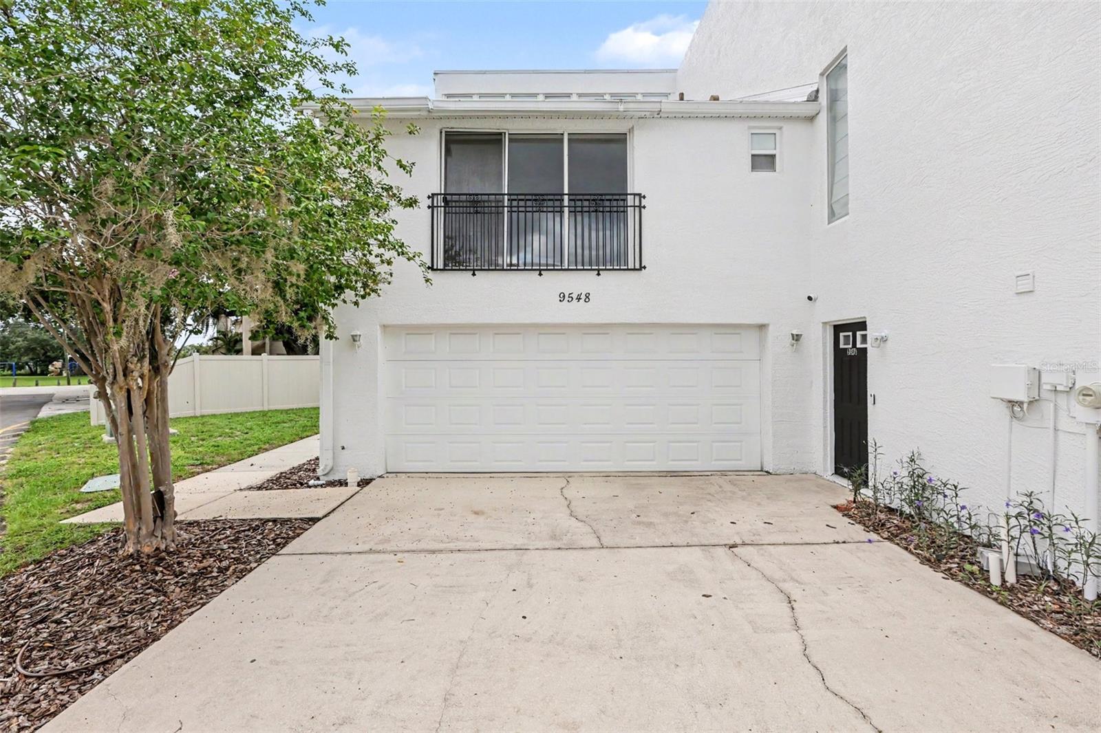 Virtually Staged. Short Sale. Lender Approval Required. Fantastic opportunity in the desirable Triad at Carrollwood community! This spacious three-story townhome features 3 bedrooms, 3.5 bathrooms, and an attached 2-car garage, making it an excellent primary residence or investment opportunity. The open-concept main level offers vaulted ceilings, abundant natural light, a convenient half bath, and a kitchen with granite countertops and stainless steel appliances. The upper levels include spacious bedrooms, each with generous closet space, two bedrooms feature private en-suite bathrooms, and there is a centrally located laundry area. Conveniently located near major highways, shopping, dining, and everything Tampa has to offer. Property is being sold AS IS. Short sale is subject to seller's lender(s) approval.