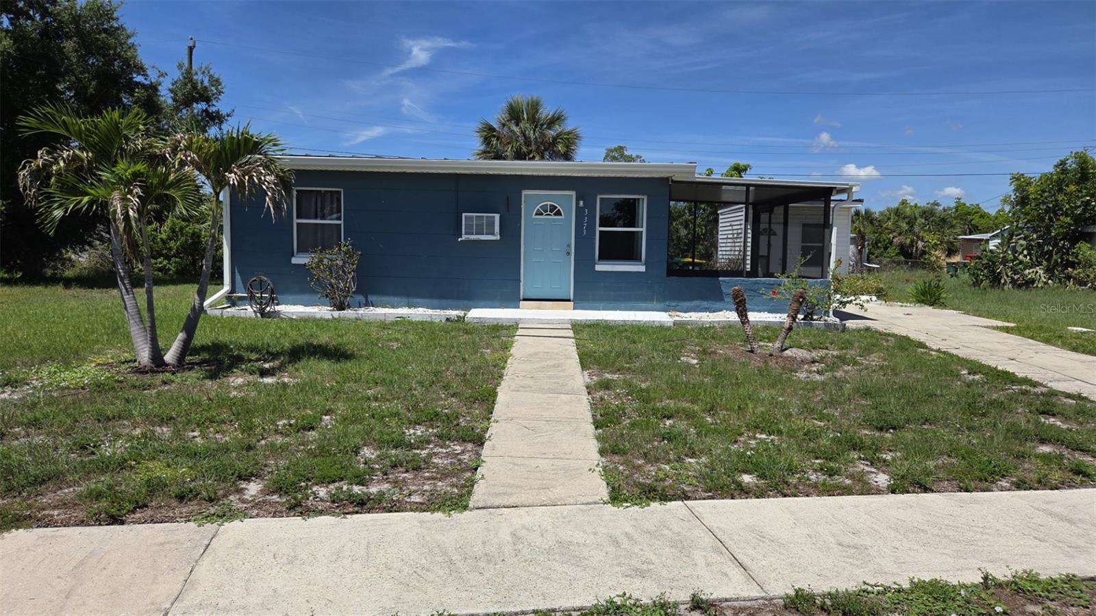 Welcome to 3373 Lucerne Terrace. This cute bungalow may be small but offers a lot of value for its size.  Both the house and the shed have a metal roof, added after Hurricane Ian in 2022. The owner added 3 new Christmas palm trees back in March and they have been watered diligently every 2-3 times a week. There is also an Avocado tree on the property that is well established and bears fruit. Walking through the front door is a decent size living room that has a beamed ceiling and original shiplap, that has been whitewashed. The gally kitchen is off the living room, with a door leading to the back yard. The kitchen can accommodate an apartment size refrigerator. Down the hallway you will find 2 bedrooms. The larger of the two will handle a full/queen size bed. The ceiling in this bedroom also has shiplap on the ceiling. A new low-profile light fixture to be added in the next week. It has generous closet space with shelving. The second bedroom is across the hall and is big enough for a twin bed or use it as an office or yoga room, also with good closet space.  The bathroom is at the end of the hall between the two bedrooms.  In the back of the house is a utility room that holds the hot water tank and access to the washer dryer hook-ups.  Out back is a really nice storage shed with shelving and a workbench. This cute home could be adorable for a young couple just starting out, a vacation home or a rental.  Lucerne Ter. is located in the heart of Port Charlotte and close to everything, including beaches, fishing, dining, shopping and medical. Come take a look and make it yours today!