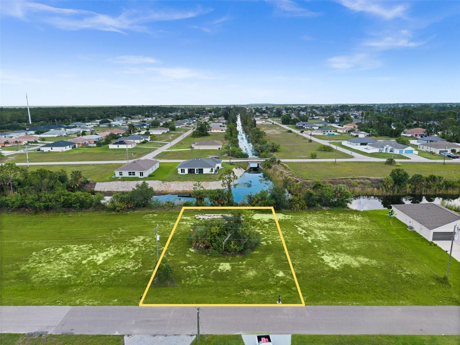 Build your dream home on this beautiful freshwater intersecting canal lot in desirable NE Cape Coral. Enjoy expansive water views, added privacy, and direct access to a large intersecting  freshwater canal system perfect for kayaking, fishing, and boating with electric or small watercraft. Conveniently located near shopping, dining, schools, parks, and everyday amenities while still offering a peaceful residential setting. No HOA fees and plenty of space to design your custom Florida home with a pool and outdoor living area. Whether you're ready to build now or invest for the future, this is a fantastic opportunity in one of Cape Coral's fastest-growing areas.