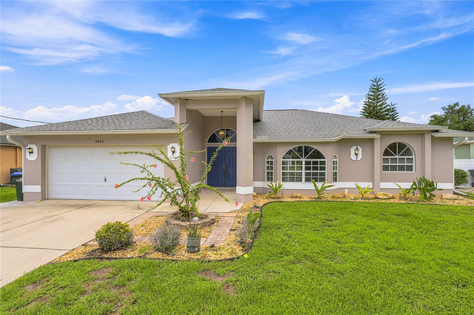 Welcome to 4042 Duluth Terrace in North Port's desirable Cranberry Fields neighborhood! This thoughtfully designed, 3-bedroom, 2-bath home offers an ideal combination of space, functionality, and convenience. Located just minutes from I-75, shopping, restaurants, schools, and everyday amenities, you'll appreciate the easy commute while enjoying the feel of an established neighborhood.

Step through the inviting double-door entry into a bright, open floor plan featuring soaring ceilings and fresh neutral paint inside and out, creating a move-in-ready canvas for your personal style. With both a spacious living room and a large BONUS FAMILY ROOM, there's plenty of space for entertaining, relaxing, or everyday living.

The kitchen is equipped with stainless steel appliances and overlooks the large family room and features a convenient pass-through window to the screened lanai, making outdoor dining and entertaining a breeze. Beyond the lanai, an additional patio provides even more outdoor living space.

The split-bedroom layout offers privacy, and every bedroom includes a walk-in closet for exceptional storage. The guest bath features direct access to the patio, providing an ideal setup should you choose to add a future pool. A dedicated laundry room is conveniently located near the guest bedrooms. The primary bedroom offers a separate slider out to the lanai, large walk in closet and en suite bathroom with separate garden bath and walk-in shower.
Major updates provide added peace of mind, and this home includes a 2023 ROOF and a 2025 HVAC system. Whether you're looking for your Florida home, seasonal retreat, or investment opportunity, this property offers a versatile floor plan, thoughtful updates, and a location that's hard to beat.

Schedule your private showing today and discover everything 4042 Duluth Terrace has to offer!