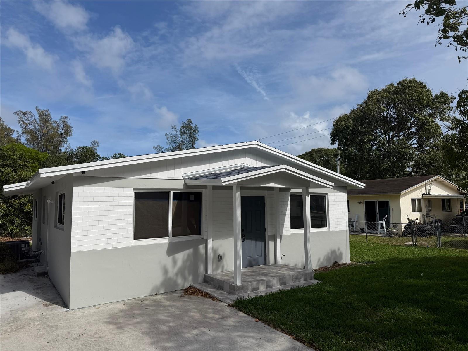 Beautifully renovated and move-in ready, this Deerfield Beach residence offers a bright and comfortable open-concept layout with modern finishes throughout. The home features large-format tile flooring, recessed lighting, and a stylish kitchen with white shaker cabinetry, stone-inspired countertops, stainless steel appliances, an undermount sink, and a full-height tile backsplash.

The updated bathrooms offer a fresh contemporary design, including a glass-enclosed shower with a spa-inspired niche and a beautifully finished tub/shower combination. Spacious bedrooms provide plenty of natural light, comfortable living spaces, and a neutral design that complements any style.

Additional features include an interior laundry area, covered entry, driveway parking, and private yard space. Ideally located near Deerfield Beach, the International Fishing Pier, Quiet Waters Park, Constitution Park & Arboretum, and popular waterfront dining at The Cove, this home offers the perfect combination of comfort, convenience, and South Florida living.