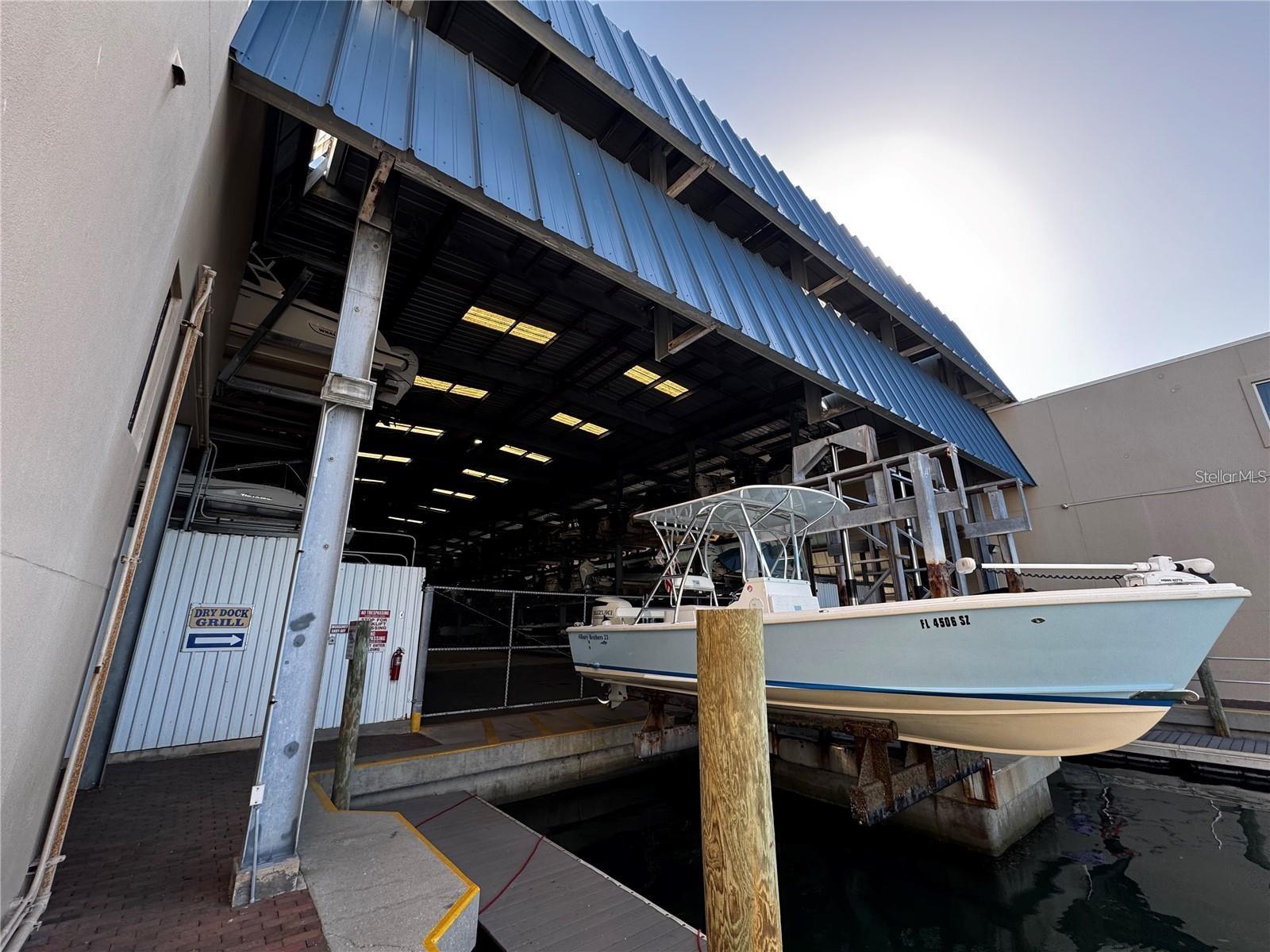 Welcome to Slip #2112 at The Boathouse on Longboat, rare opportunity on the coveted south end of Longboat Key! This is your chance to secure a covered, hurricane-protected slip in one of Sarasota's most desirable waterfront communities. This slip accommodates boats up to 23'6"Lx8'6"Wx7'2"H (No T-tops unless collapsible). Enjoy first-class service at an affordable monthly rate with unbeatable amenities. Located just minutes from both Sarasota Bay and the Gulf, this facility offers on-site fuel, restrooms, a ship store, maintenance services, leasing assistance, and even the popular Dry Dock Waterfront Grill restaurant on site. Simply call ahead and your boat will be launched, fueled, and waiting for you. At the end of the day, return to dock and watch as the team expertly rinses and stores your boat in its covered slip. This is more than boat storage, it's effortless boating in paradise. Don't miss your chance to own high and dry covered storage on Longboat Key!