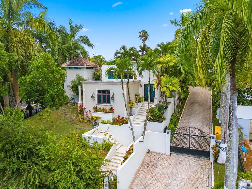 Located in the exclusive Santa María, this spectacular residence is where luxury, privacy, and entertainment come together in one of the most exceptional properties currently on the market.

Designed with elegant architecture and thoughtfully curated living spaces, this remarkable home features an impressive gourmet kitchen, custom wine cellar, stunning entertainment areas, resort-style pool, and lush tropical gardens that create a truly unique living experience.

 Custom Wine Cellar
 Entertainment Lounge & Billiard Room (Man Cave)
 Resort-Style Pool
 Private Gated Entrance
Expansive Spaces Full of Character
 3-Car Covered Garage
 Photovoltaic Solar System with Battery Backup
 Full Power Generator

…and many more exceptional features throughout.

This is a property that must be experienced in person to truly appreciate everything of it

Situated on a prime corner lot on Calle Orquidia in Santa María, the residence  approximately has 5,026 Sq. Ft. of GLA on 1,440 square meters of land.