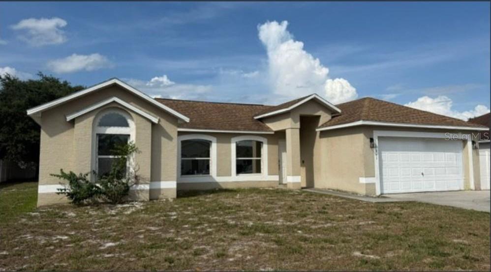 Welcome to this beautiful open concept home with 4 bedrooms, 2 baths, living room and dining room combo. You will be impressed with the high ceilings and spacious kitchen. The comfortable master with amazing view. This suite has walk-in closet and bathroom with two sinks, tub with separate shower, and linen closet. Bedroom with a backyard view ideal for a home office, media room, or playroom. The huge patio and cover lanai space will give you the opportunity to enjoy with your family the excellent weather of Florida. Great Opportunity to join this exquisite area located minutes away from 192 Rd. road for easy access to turnpike, restaurants, pharmacies, hospital, medical offices, mall and supermarkets. This exceptional home combines comfort, elegance, and location — the perfect place to call home.