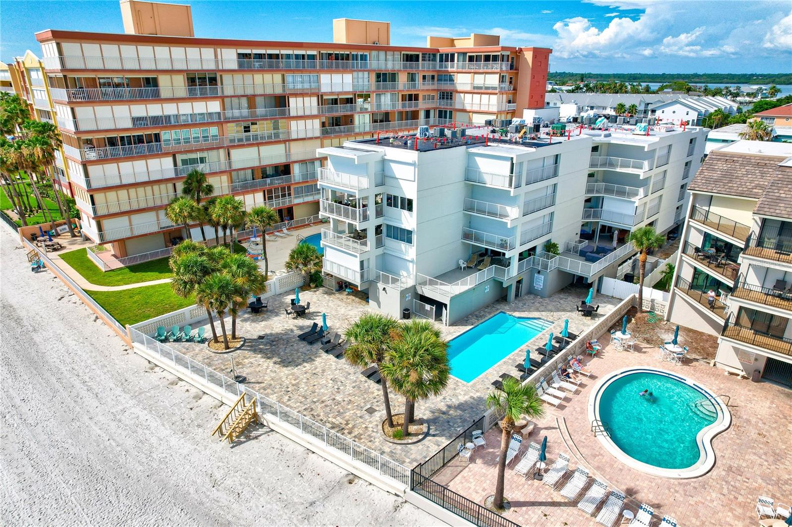 Experience the ultimate in coastal living with this rare opportunity to own a fully remodeled and fully furnished four-bedroom, three-bathroom luxury beachfront condo in the boutique community of Mariner’s Light in Redington Beach. Motivated sellers! This expansive 1,835 sq. ft. end unit offers panoramic, unobstructed views of the Gulf of Mexico, complemented by an oversized 385 sq. ft. private balcony—partially covered for year-round enjoyment—and its own private spiral staircase providing direct access to the garage, pool area, and beach. Sold completely furnished, the property is move-in ready and offers excellent investment advantages, including potential cost segregation benefits.

Inside, the condo features high-end finishes throughout, all-new hurricane-impact windows and sliding doors, new electric hurricane shutters on the balcony, and two HVAC systems, one replaced in 2022, ensuring comfort and peace of mind. The residence includes two private garage parking spaces as well. Mariner’s Light offers a heated beachfront pool, is pet-friendly for up to two small pets, and sits directly across from a beautiful park. The building completed a renovation including new elevator, upgraded sprinkler and fire alarm systems, fully remodeled hallways and lobbies, new lobby windows and doors, new guardrails throughout, and gemstone balcony flooring. With a newer roof and no special assessments pending, the property is truly ahead of the curve.

This condo is also ideal for investors, offering a flexible rental policy with a minimum seven-day rental —perfect for personal use when desired and rental income when not in use. Located walking distance of fantastic restaurants, shops, and beachside amenities, this residence delivers the perfect blend of luxury, convenience, and income potential. Don’t miss this chance to own a one-of-a-kind beachfront property on Redington Beach. Schedule your private showing today and make your Gulf-front dream a reality.