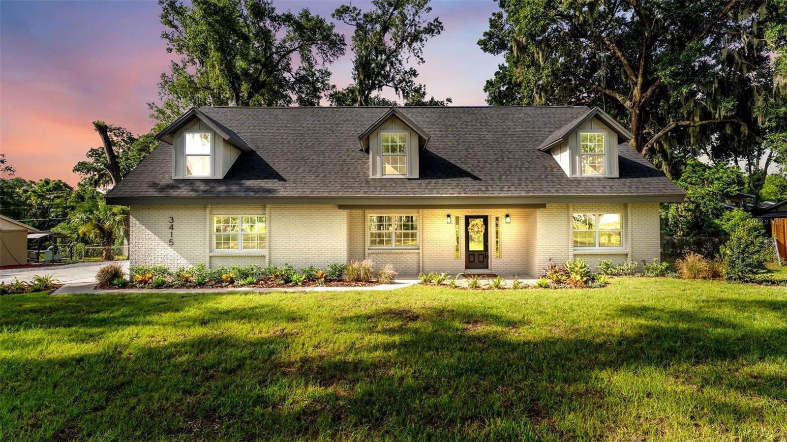Welcome to this beautifully updated and spacious 4-bedroom, 3-bath home situated on nearly half an acre in one of South Lakeland’s most sought-after zip codes! From the moment you enter, you’ll be impressed by the breathtaking foyer and elegant iron staircase that sets the tone for this stunning home.Just off the front entry is a versatile bonus room that can easily serve as a home office, playroom, guest room, or potential 5th bedroom. The heart of the home is the custom-designed kitchen featuring a large center island, granite countertops, double ovens, a farmhouse sink, and picturesque views of the expansive backyard.The spacious primary suite offers a beautifully updated en-suite bath with dual sinks, granite countertops, smart mirrors, and a large walk-in shower. Upstairs, the oversized hall bath has been fully renovated with modern finishes, dual vanities, and granite counters.Continue up to the third-floor loft, an incredibly spacious flex area perfect for a private office, gym, media room, playroom, or additional storage.Outside, enjoy a large fenced backyard with plenty of room for entertaining, pets, or future additions. Located in an established neighborhood with NO HOA and NO CDD, this home combines space, style, and freedom.Major updates completed in 2026 include a BRAND NEW ROOF, AC SYSTEM, and ELECTRICAL, offering peace of mind for years to come.Don’t miss this rare opportunity to own a move-in-ready home with exceptional space and modern upgrades in prime South Lakeland!