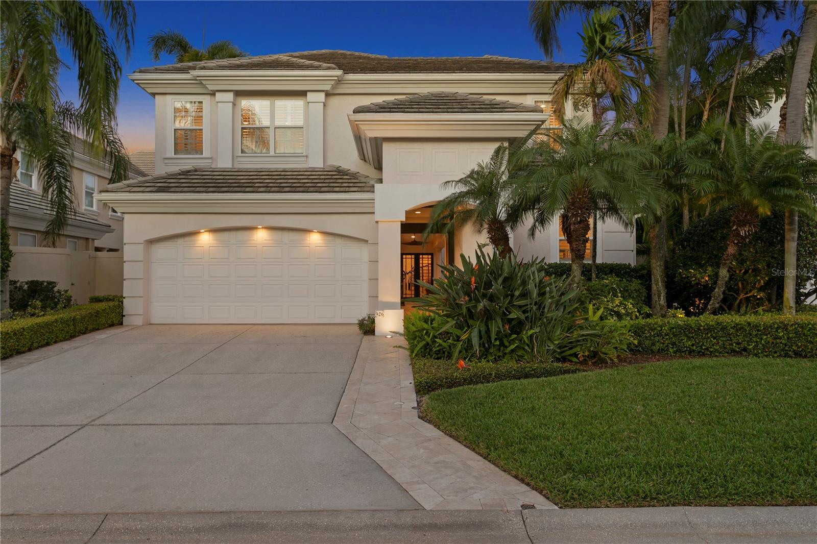 Welcome home to this meticulous single-family courtyard-style home in the Island
Homes neighborhood on beautiful Harbour Island, a one-of-a-kind masterpiece suitable
only for the most discerning buyer. No expense was spared in the original construction
or the artfully crafted renovations, which features 10' ceilings (on both the 1 st and 2 nd
floor), many with 11+' decorative trays and backlit crown molding. From the moment you
arrive, you’re swept into a wonderful private, lushly landscaped courtyard with a
gorgeous pool with waterfall and specialty lighting that sits between the home and the
detached guest casita, that is perfect for an au pair, mother-in-law suite, office, art
studio or anything your imagination conjures. Overall, the home boasts approx. 6,002
sq. feet with five bedrooms and 5.5 baths, formal living and dining rooms, and a
generous family room open to the kitchen. A lovely sweeping staircase, enhanced with
specialty lighting sconces, to the second floor leads to an abundant recreation room,
adjacent to an art deco-inspired media room. The luxurious primary suite, with an
adjacent private office with a balcony, overlooks the lovely courtyard, and further
elevates this exceptional property. Just a short walk away, residents enjoy access to the
Island’s central park, playground, boat docks / marina, and waterfront walkways, as
well. Harbour Island is a 24-hr. controlled access and planned community in the heart of
the city with walkable convenience to the new LifeTime Fitness on Harbour Island,
Tampa’s Riverwalk, Water Street, Amalie Arena and Sparkman’s Wharf, all offering a
wide array of excellent restaurant and retail options. It is rare for a home of this size to
be offered at this price point on Harbour Island – So, what are you waiting for . . .. come
live an amazing lifestyle of which you have always dreamed!