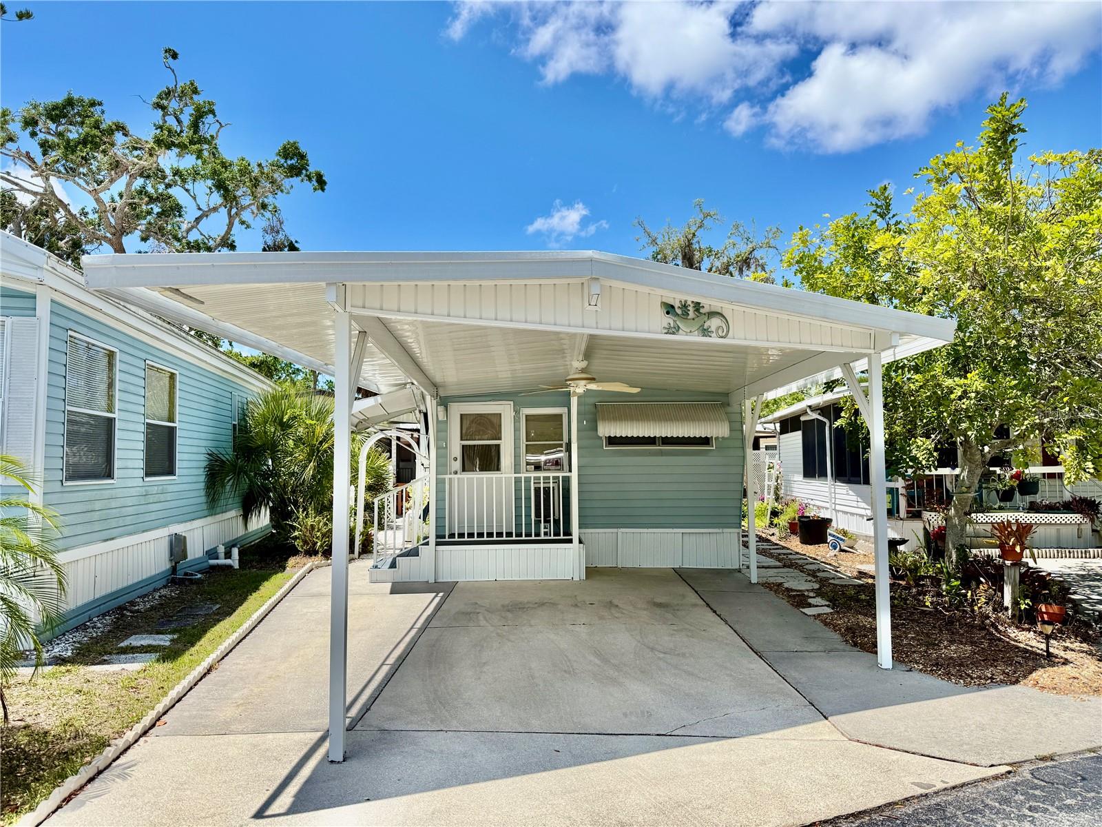 Welcome to your charming retreat in one of the area’s most sought-after 55+ gated communities! This cozy 1-bedroom, 1-bathroom home offers the perfect blend of comfort and convenience, ideal for full-time living or a relaxing seasonal escape. Enjoy peace of mind with a newer AC unit, a tankless hot water heater, and modern appliances, including a solid surface stove, washer, and dryer. The home also features a convenient carport and is perfectly positioned across from the bath house, with the large heated community pool just a short stroll away.

The community itself is packed with amenities to support an active and social lifestyle—enjoy the pickleball courts, spend tranquil mornings on the fishing pier, or take advantage of the boat storage and clubhouse for gatherings and events, such as dinners and yoga. All of this comes with incredibly low HOA fees of just $147 a month!

Whether you’re looking for an easy-to-maintain home base or a vibrant place to enjoy retirement, this property offers exceptional value in a beautifully maintained community. Come see why so many love calling this neighborhood home!