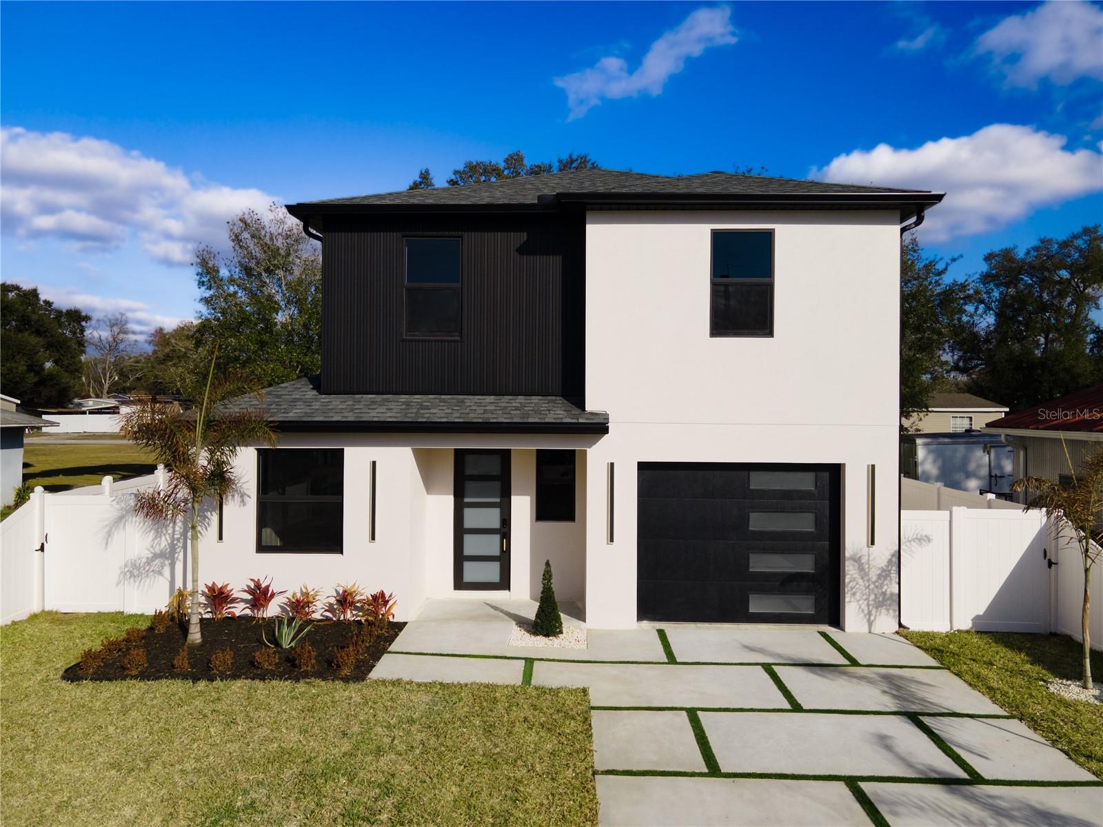 One or more photo(s) has been virtually staged. Welcome to 12905 Worcester Ave, an exceptional opportunity to own a brand-new construction home in one of Tampa's rapidly evolving areas. Thoughtfully designed with today's buyer in mind, this home offers modern finishes, energy-efficient construction, and the peace of mind that only a newly built home can provide.

Buyers will appreciate the included 1-2-10 Builder Warranty Program, offering 1 year workmanship coverage, 2 years on major systems, and 10 years of structural protection. With everything brand new—from the roof and HVAC system to plumbing, electrical, and appliances—owners can enjoy years of low-maintenance living and significantly reduced repair concerns compared to older homes.

Located outside of a flood zone, this property qualifies for substantial insurance savings while providing added peace of mind. New construction standards, impact-resistant features, and updated building codes can also contribute to lower insurance costs and improved energy efficiency.

The surrounding neighborhood is experiencing significant growth, with numerous new construction projects and redevelopment underway, making this an exciting opportunity to purchase in an area poised for continued improvement and appreciation.

Featuring a modern open-concept layout, designer finishes, quartz countertops, custom cabinetry, spacious living areas, and quality craftsmanship throughout, this home delivers outstanding value at an attractive price point.

A rare chance to own a brand-new home with warranty protection, lower maintenance costs, potential insurance savings, and strong future upside in a growing Tampa location. Easy to show.