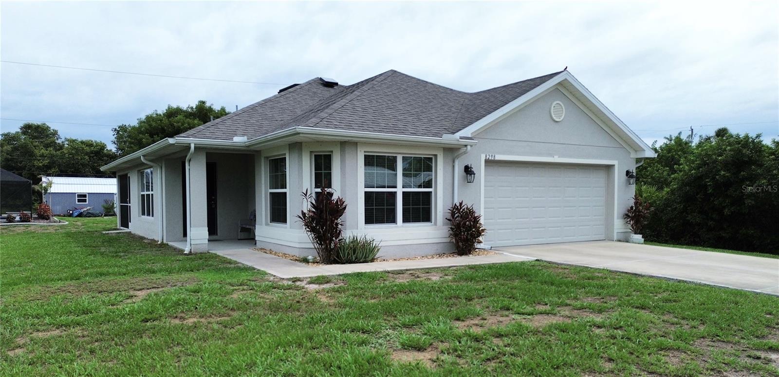 Welcome to this charming 3-bedroom, 2-bath split floor plan home with a 2-car garage in a prime North Port location! This well-maintained property features FULLY PAID-OFF SOLAR PANELS, helping significantly reduce monthly electric costs. Situated on PUBLIC WATER and equipped with an additional water purification system, this home offers both efficiency and peace of mind. Best of all, it is not located in a flood zone and comes with no HOA, deed restrictions, or CDD fees — giving you true Florida freedom. Outdoor enthusiasts will love being nestled near the Legacy Bike Trail, perfect for biking, walking, and enjoying the Florida sunshine. Inside, the open floor plan offers comfortable living with a spacious kitchen and combined dining area, ideal for everyday living and entertaining. Step outside to a generously sized backyard featuring two storage sheds (8x8 and 8x12), offering plenty of room for tools, hobbies, or extra storage. Conveniently located near Warm Mineral Springs, North Port Aquatic Center, Butler Park, and the North Port Parks & Recreation, this home offers easy access to recreation and community amenities. It’s just minutes from Wellen Park, the new Costco Wholesale, and less than 30 minutes to the beautiful Gulf beaches. Centrally located with quick access to Venice, Englewood, Port Charlotte, Punta Gorda, and Sarasota, this property offers both convenience and lifestyle. Don’t miss the opportunity to make this exceptional home your own — schedule your private showing today!