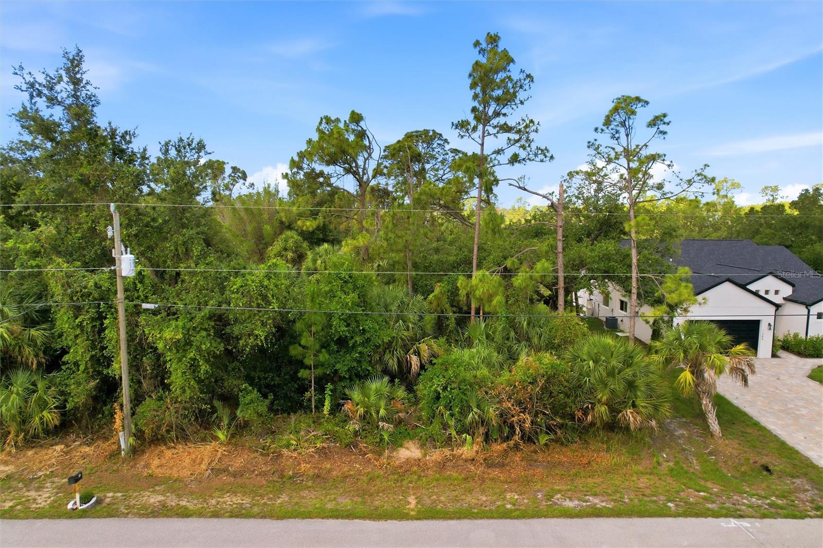 Build your Florida dream home on this spacious vacant lot located on Oregon Ln in the growing community of North Port, FL 34286! Situated in a quiet residential area with no HOA fees, this property offers the perfect opportunity for builders, investors, or anyone looking to create their own private retreat. Conveniently located near shopping, dining, schools, parks, golf courses, and beautiful Gulf Coast beaches. Enjoy easy access to I-75 for commuting to Sarasota, Fort Myers, and surrounding areas. North Port continues to grow rapidly, making this an excellent investment for the future. Don’t miss your chance to own land in one of Southwest Florida’s most desirable and expanding communities! Buyers, do your due diligence.