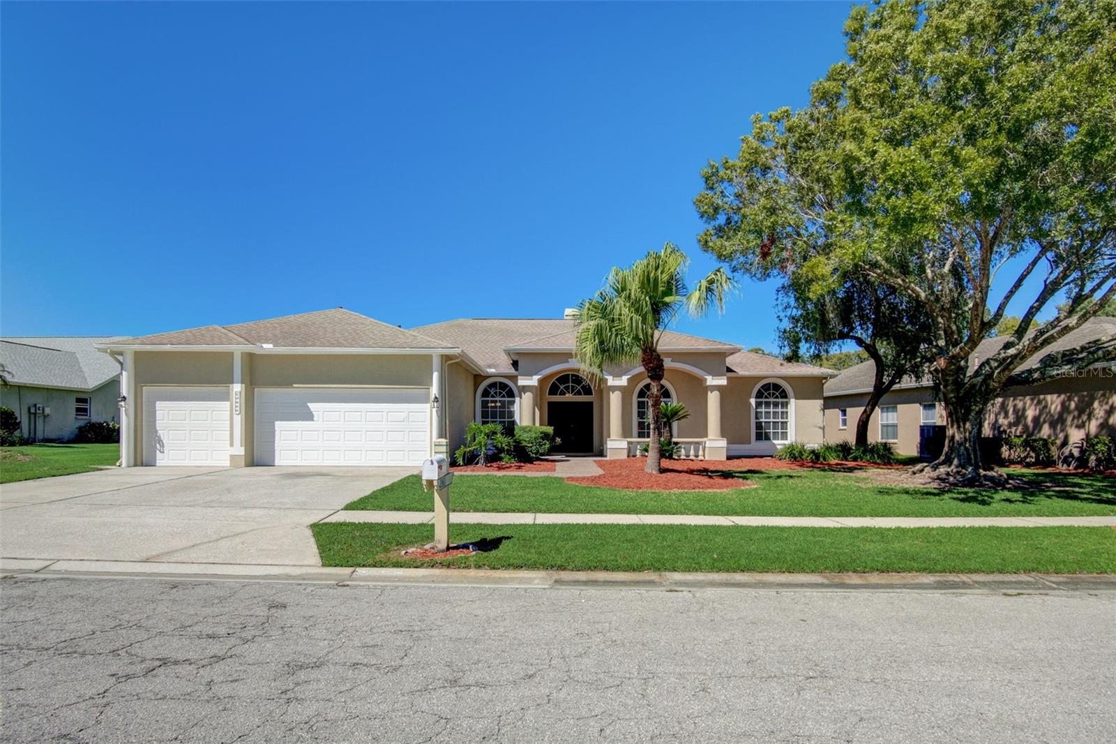 Welcome home! This wonderful 4 bedroom 2 bath completely remodeled home is located in the popular community of Meadow Pointe. As you pull up to this great home you’ll immediately notice the mature landscaping, 3 car garage and NEW paint. Step inside and you’ll be dazzled by the large open floor plan that includes a living room with fireplace, dining area and breakfast nook. There’s more fresh paint and NEW luxury vinyl flooring that runs throughout the home. There’s also new carpeting in the bedrooms. In the island kitchen you’ll find NEW shaker style cabinets, NEW gleaming granite countertops and a NEW stainless steel range, microwave and dishwasher. Head into the primary bedroom and you’ll find a spacious walk in closet just waiting to be customized. The ensuite bathroom features a granite topped dual sink vanity, custom shower and a water closet with a toilet and a bidet. This split plan home also features 3 more bedrooms and an update hall bathroom. Head out onto the large back porch and enjoy the view out across the back lawn and the sparking water of the pond beyond. This is the perfect place for entertaining friends and family or just relaxing. The roof is only 4 years old and the HVAC is just 2 years old. This home is located less than 10 minutes from all of the shops and restaurants at the Shops at Wiregrass, and less than 15 minutes from I-75. Don't miss your chance to own this wonderful home - make an appointment to see it today!