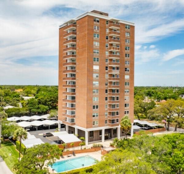 Experience waterfront living at an exceptional value with this move-in ready 2-bedroom, 2-bath condominium on iconic Bayshore Boulevard, offered at just $300,000. From the moment you step inside, you'll be captivated by the stunning bay views that create the perfect backdrop for everyday living.  The thoughtfully designed open floor plan offers a bright and inviting living space, engineered hardwood floors complemented by wood cabinetry, abundant storage, stainless steel appliances, and central air conditioning. The spacious primary suite features an en-suite bath and the added convenience of an in-unit stackable washer and dryer—a rare and highly desirable feature in this building.  Relax on your private balcony while taking in spectacular sunsets over the bay, or enjoy the community's waterfront pool overlooking Bayshore Boulevard, home to Florida's longest continuous sidewalk and renowned 5-mile linear park. Residents also enjoy an impressive collection of amenities, including assigned covered parking, ample guest parking, bicycle storage, a private storage unit, fitness center, on-site management and maintenance, laundry facilities, and a beautifully furnished guest suite with kitchenette available for visiting family and friends.  The building has been well maintained and offers valuable peace of mind with a new roof installed in 2025.  Ideally situated in one of South Tampa's most sought-after neighborhoods, this residence is zoned for top-rated Roosevelt Elementary, Coleman Middle, and Plant High School. Enjoy the convenience of walking to local restaurants, boutique shopping, parks, and all the vibrant lifestyle amenities that make Bayshore Boulevard one of Tampa's most desirable addresses.  Don't miss this rare opportunity to own a waterfront condominium with breathtaking views, outstanding amenities, and an unbeatable location at an exceptional price.