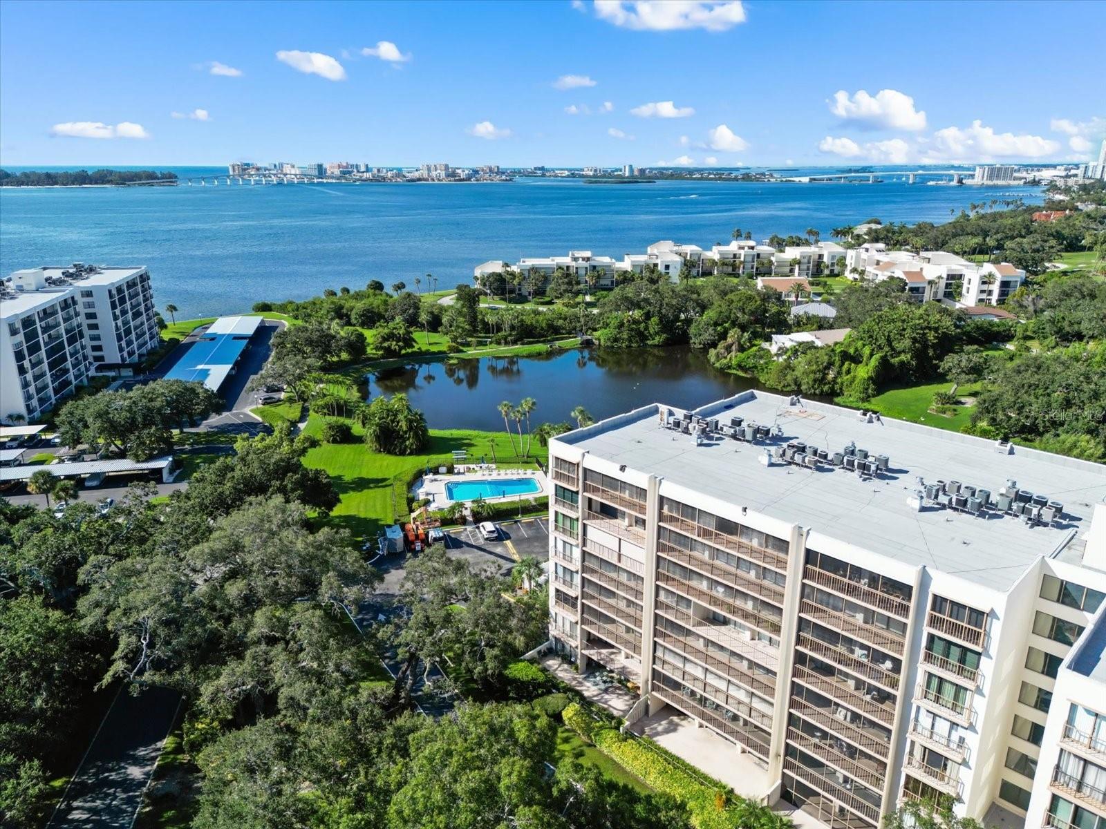 LOWEST PRICED 2 BERDROOM IN BELLEAIR COUNTY CLUB. CALL TODAY! MINUTES TO THE OCEAN IN THE BEAUTIFUL GATED BELLEAIR COUNTRY CLUB COMMUNITY. This 2 bedroom, 2 bath has 1,310sf with an open floor plan and 1 car carport, 2nd closest to the building. Extra clean and ready for your personal touches, this condo has an unbelievable 39’ balcony with a partial view of the Intracoastal and GULF. The spacious living room opens to the balcony where you can enjoy the balmy Florida weather. The master suite is large enough for a king bed and has a private en-suite bath and double closets. The guest bedroom offers plenty of light through the slider to the patio and opens into the living room creating an open airy feeling. The Belleview Biltmore Villas offers idyllic scenery around the community and a HEATED AND CHILLED swimming pool with BBQ and waterfront seating. Tucked away in the back of the community and yet still close to the Belleair Country Club makes it an ideal location. Residents may skip the waiting list and be approved for access to membership at the Belleair Country Club, with activities abound! This private 24-hour manned gated community features Florida's oldest golf course and has two championship Donald Ross designed golf courses, fine dining, tennis courts, an exceptional gym, pickleball courts (all with separate membership). Plenty of highly rated restaurants, shopping & world class medical nearby. Award winning Clearwater Beach is only minutes away over the causeway. The $86 Million Coachman Park offers many FREE amenities and the open-air concert venue, The Sound Amphitheater offers big name artists. You’re only 30 minutes to Tampa International Airport, 20 minutes to the mall, and 5 minutes to Publix. Doesn’t get much better than this! Call today!