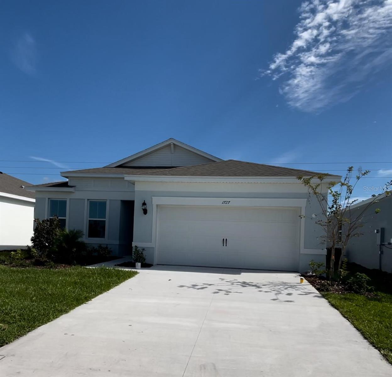 This beautiful home is Located in the Adams Homes Community of Citrus Landing in Davenport very close to 27 and I-4. This home comes loaded with upgrades like 5 1/4" baseboards, 36" Kitchen Cabinets with crown-molding and custom bump, Craftsman style interior and closet doors with brushed nickel lever handles, All MOEN Brushed nickel faucets with Gooseneck One-Touch faucet in Kitchen, Glass-top range, dishwasher and Built-in Microwave above the Range, Upgraded Cut-pile Carpet with 6 lbs padding, Kichler Lantern Style Coach Lights installed on Garage Sides and Entry, Finished Garage, TAEXX Tubes in the walls pest defense system. All our Homes come with our legendary building quality, attention to detail, and Outstanding Customer Service.