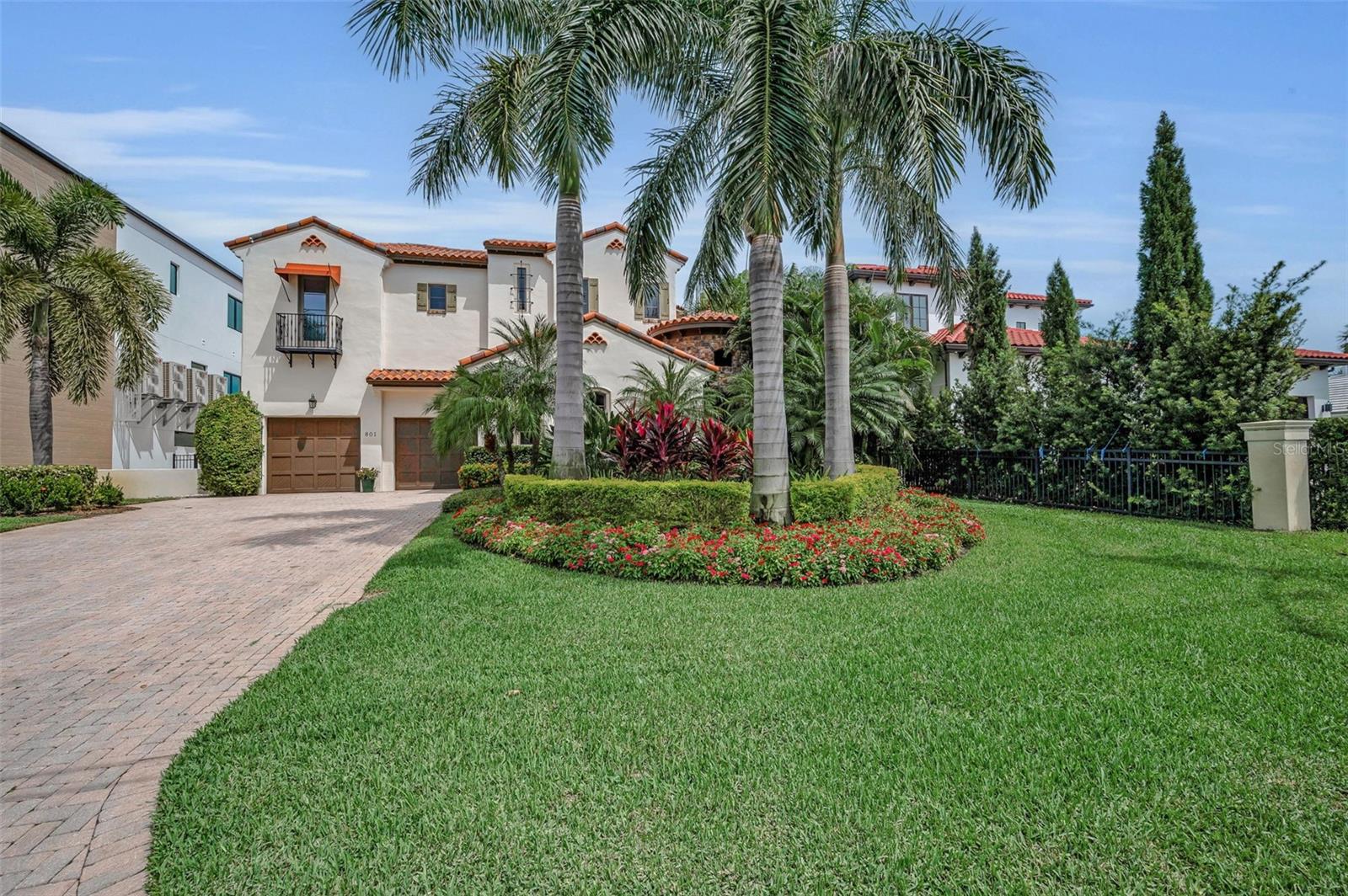 One or more photo(s) has been virtually staged. Welcome to the crown jewel of Snell Isle—where timeless elegance meets modern luxury on one of the most prestigious waterfront streets in all of Pinellas County. Built in 2005 by award-winning Windstar Homes, this 5,834 sq. ft. stunner is more than a home—it’s a lifestyle statement. Located on a deep protected canal with direct access to open Tampa Bay. From the moment you enter into the private courtyard, complete with a bubbling fountain, you’ll know this is something special. Inside, high ceilings, rich finishes, and sun-drenched spaces set the tone. An absolute ideal layout with four en-suite bedrooms, a private guest suite, executive study, and a second level bonus room or family room nestled in between the two additional bedrooms. The kitchen is a showstopper—custom cabinetry, gleaming granite, Wolf appliances, and a double Sub-Zero fridge all flowing effortlessly into the family room, where walls of glass frame postcard-worthy views of the pool, dock, and calm canal waters.  Upstairs, the primary suite is your personal sanctuary. Sip your morning coffee on the private lanai as the sun rises over the bay. The spa-worthy primary bath was completely reimagined in 2019 with marble floors, luxury fixtures, cabinetry and a massive walk-in closet with its own laundry. Outside, the backyard is pure Florida magic. A fully renovated pool and spa, lush landscaping, and a dock setup for the boating enthusiast—deep water slip for up to 60 feet, a 16,000 lb lift, and a separate lift for your jet skis. And yes, there’s more: a whole-house generator, impact-rated windows and doors, elevator, butler’s pantry, three-car garage, large inside laundry, natural gas, and even a second office or creative workspace tucked just off the kitchen. All of this just minutes from downtown St. Pete, Interstate 275, the Vinoy Golf Club, North Shore Park, and some of the best dining, shopping, and culture in the region. This isn’t just a home—it’s your forever vacation. Be sure to view the beautiful virtual tour.