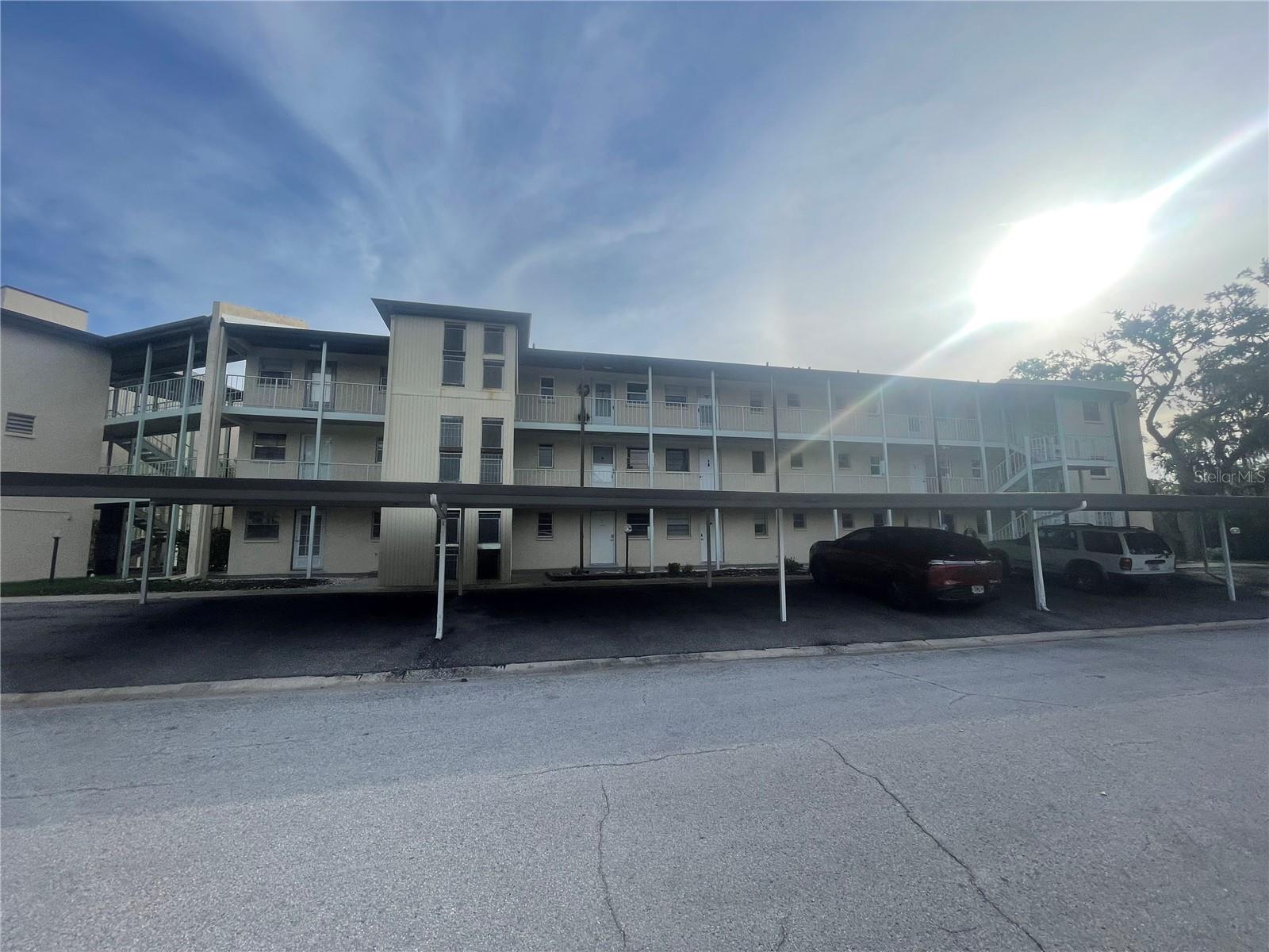 Turn-key, updated second-floor 1BR/1BA condo in New Port Richey! Upgraded flooring, central heat/air, and newer hot water heater. Offering 732 SQFT with current tenants in place paying $975/MO through 02/28/2027, providing immediate cash flow from day one. This is an affordable, low-maintenance investment opportunity with strong rental income relative to the purchase price. Ideal for a buy-and-hold investor looking to add a performing asset with stable tenancy already in place and no immediate renovation needs. OR Great opportunity for a buyer to purchase and hold until end of lease, making some extra cash until you can move in! Monthly HOA includes: internet/cable, lawn & trash service, exterior maintenance, building insurance, roof, onsite manager, clubhouse, and two pools (one heated). Optional Gulf Harbors Beach Club membership available for $200/year.