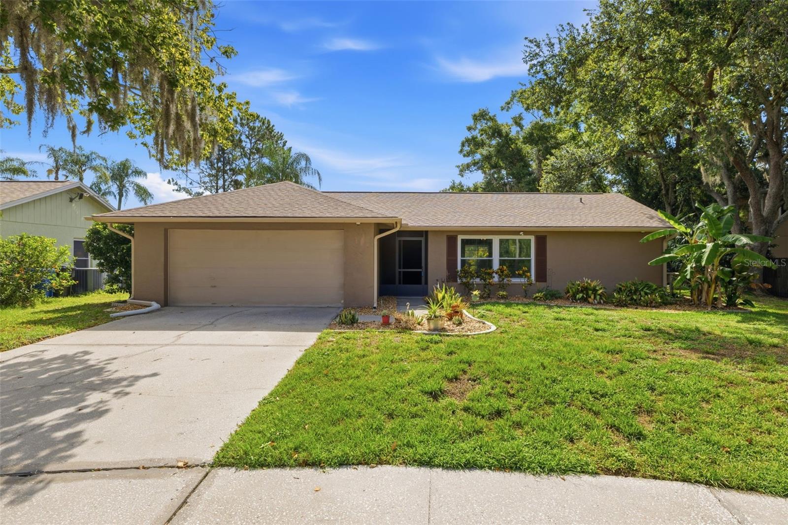 Welcome to Citrus Park in the highly coveted Turtle Creek community! This meticulously maintained, waterfront, cul-de-sac home is elegantly waiting for your arrival. The best lot in the neighborhood with only ONE neighbor! Pride of ownership really shows with this home! A brand NEW roof (June 2026), updated HVAC (2019), newer water softener system, and new washer/dryer (2021) give you fresh peace of mind with major features! The exterior curb appeal has beautiful well manicured native Florida plants and tons of yard space on the cul-de-sac! The interior of the home has a split bedroom floor plan with 3 spacious bedrooms, 2 full bathrooms and a two-car garage with plenty of storage space. The show stopper of this home is the peace and tranquility of the rear screened porch that is perfect for enjoying morning coffee while watching the wildlife near the pasture and pond! The large storage shed provides extra space to keep holiday decorations or landscape/gardening tools! This home is perfectly positioned close to shopping, dining and the Veterans expressway. Call or text today to schedule your viewing! This home is calling its next owner, and this is your opportunity to act NOW!