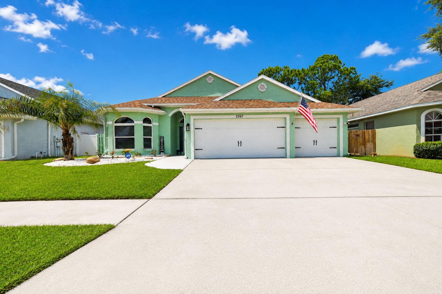 MOVE IN READY in the gated Forest Ridge community! This beautifully updated 4 bedroom, 2 bath home with a 3 car garage features freshly painted ceilings and walls, along with a fully repainted exterior completed in 2025 and new gutters with leaf guard. The remodeled kitchen offers quartz countertops, a farmhouse sink, undercabinet accent lighting, smart stove and microwave appliances that can be operated directly from your phone and soft close cabinetry. A brand new dishwasher was installed in 2025, and both bathrooms have been tastefully updated and also has soft close cabintry. The home includes a wood burning fireplace and has no carpeting—only real hardwood, tile, and luxury vinyl flooring throughout. Automated shades enhance all 5 sliding doors and the picture window, and a transferable ADT alarm system provides added security. Major upgrades include a 22kW whole house Generac generator powered by propane, new impact windows, and 5 brand new double pane sliding glass doors with Kevlar protection panels. The roof and A/C are both 8 years old, and a new hot water heater was installed in 2025. Additional features include a water softener, an irrigation system on its own well, and a garage door equipped with a keypad, built in camera, and phone operated access. An oversized screened in lanai under roof offers exceptional bonus living space perfect for relaxing or entertaining. Conveniently located near the Tarpon Springs Sponge Docks, Howard Park, Sunset Beach, Honeymoon Island, and Downtown Dunedin, with medical facilities, schools, and shopping close by, this Forest Ridge home is truly move in ready with every major upgrade already completed.