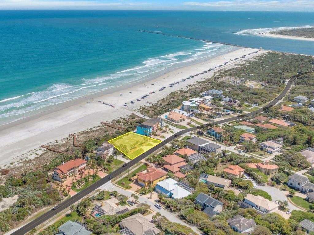 DISCOVER THIS EXCEPTIONAL OPPORTUNITY TO ACQUIRE THREE (3) DIRECT OCEANFRONT PARCELS IN THE HIGHLY COVETED COASTAL ENCLAVE OF PONCE INLET ON THE PRISTINE WHITE SAND 'NO DRIVE' BEACH!! These three lots are the only undeveloped parcels in this exclusive boutique community known as The Cottages in Ponce Inlet. The Cottages is defined by its thoughtfully designed detached residences, private entrances, spacious two-car garages, and serene courtyard-style living that includes your own secluded backyard retreat--perfectly positioned against protected dunes for enhanced privacy and peace-of-mind. Residents enjoy private beach access via a dedicated walkover to the pristine 'no-drive' beach, offering a tranquil and unspoiled coastal experience. The four existing residences within the community are solid block construction and showcase refined craftsmanship, private elevators & expansive verandas boasting sweeping ocean views on both the second and third levels. This offering includes all three parcels as a package, encompassing 4873 S Atlantic (Unit 1), 4875 S Atlantic (Unit 2), and 4877 S Atlantic (Unit 3) featuring an impressive 173 feet of total road frontage. These cleared, build-ready homesites present a remarkable opportunity to build three oceanfront residences in one of Florida's most desirable coastal settings. Build your dream residence on one lot while selling the other two, or build three separate residences to accommodate family and future generations in a shared yet private seaside setting. Whether you choose to maximize value, create a multi-home retreat, or secure long-term investment potential, this rare offering delivers both flexibility and the chance to enjoy an irreplaceable oceanfront lifestyle. Enjoy the convenience of walking or biking to local attractions including the iconic Ponce Inlet Lighthouse, Jetty Park, and the Marine Science Center. Indulge in waterfront dining and live entertainment, or take advantage of the area's abundant recreational offerings such as charter fishing, boating, marina access, surfing, kayaking, canoeing, parks, nature preserves, museums, and even a dog-friendly beach. Reach out today for additional information or to arrange your private showing of this exceptional opportunity.