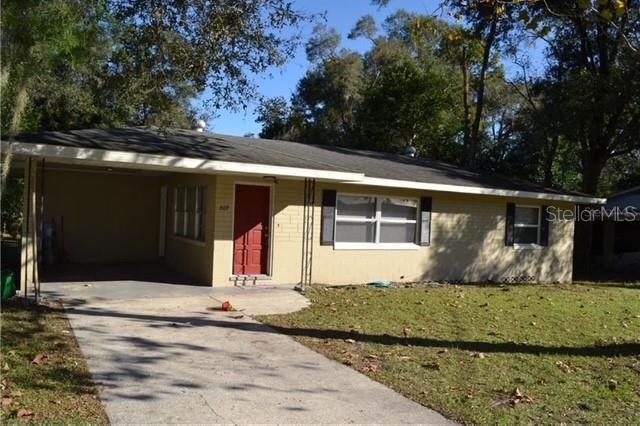Opportunity awaits in Stetson Highlands! This sturdy concrete block home sits on a quarter-acre lot and offers two roomy bedrooms, one bath, and an open living/dining/kitchen flow. Gorgeous original wood floors elevate the space with warmth and durability.

Step outside to a huge backyard ready for barbecues, pets, and play. The covered carport keeps your car cool and dry, while the screened patio is perfect for relaxing evenings. An interior laundry room with patio access adds extra convenience.

Don’t miss your chance — this home is ready for your personal touch.
All room sizes are to be verified by the buyer.