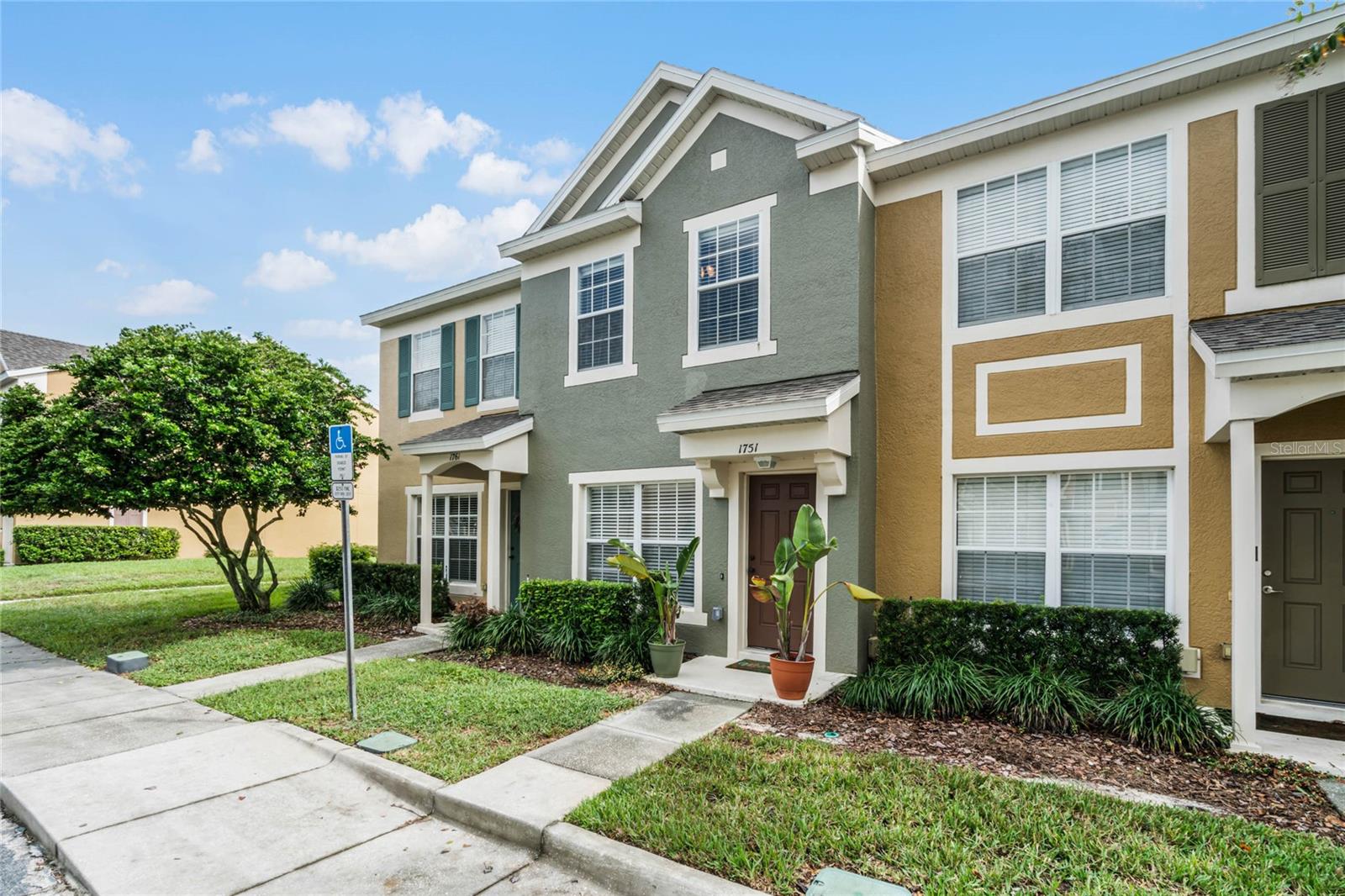 As you step inside this meticulously maintained townhome, you'll immediately notice the welcoming open floor plan that allows natural sunlight to flood the space, complemented by high ceilings and easy-to-maintain luxury vinyl plank flooring. The living area seamlessly flows into the kitchen, making it an ideal setup for hosting friends and family. The kitchen is sure to impress with its sleek black stainless steel appliances, granite countertops, and 42" cabinets to store all your kitchen tools. Venturing upstairs, you'll discover two generously sized bedrooms, each boasting its own private en-suite bathroom and oversized closets for all your storage needs. For added convenience, the laundry closet is also situated on the second floor - no more hauling laundry up and down the stairs. Step outside through the sliding glass doors onto your private screened-in lanai, where you can enjoy peaceful waterviews while sipping your morning coffee or unwind during a thunderstorm. This home has been thoughtfully updated with new appliances in 2018, a new hot water heater in 2022, a new A/C (both inside and out) in 2018 with coils replaced in 2023, and a new roof in 2021. You'll also have the convenience of an assigned parking space and super-fast fiber internet already set up. Worry-free living is a reality here, as the HOA includes water, sewer, trash, and pest control. They also diligently maintain the community, allowing you to enjoy a stress-free living experience. Location is key, and this home does not disappoint. You'll be just a short drive away from all the action, including Historic Downtown Sanford (10 min), Seminole Town Center (5 min), Colonial Town Park (10 min), and even New Smyrna Beach (35 min)! Plus, traveling and commuting are a breeze with easy access to the 417, 429, and I-4, all just minutes away. It truly doesn't get any better than this! Don't miss out on this opportunity to start living the good life. Schedule your private showing today and make this fantastic townhome your own!
