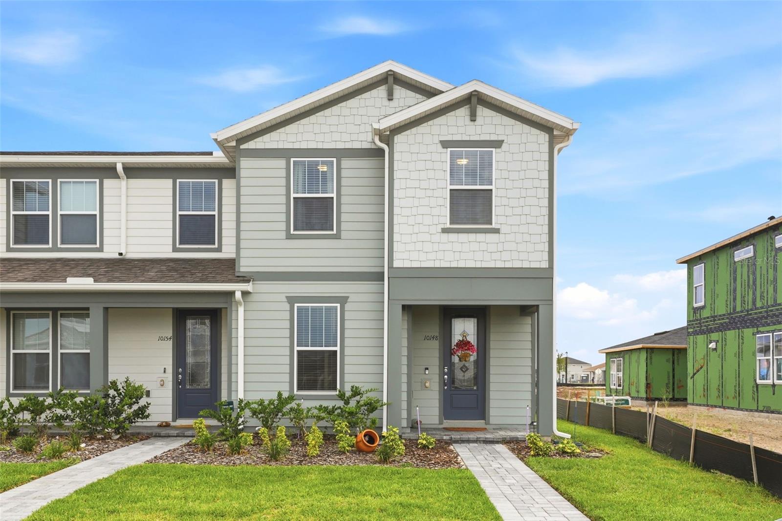 MOVE-IN READY 4 BEDROOM 3  BATHROOM townhouse in the gorgeous Everbe community! As you enter the front doors you are greeted by an open concept of a living room/dining room/kitchen combo with beautiful vinyl hardwood flooring throughout. The first floor also features a bedroom and full bathroom. Located on the 2nd floor you will find all remaining bedrooms and bathrooms. Master suite includes a large master bath with a stand up shower and oversized walk in closet. Remaining bedrooms are spacious and share a hallway bathroom. Enjoy a OVERSIZED PATIO for entertaining and a detached 2 CAR GARAGE. Townhome is LESS THAN ! YEAR OLD. Located in a family-friendly neighborhood, minutes away from top-rated schools, shopping, dining, and Lake Nona's Medical City! Enjoy the Everbe living!