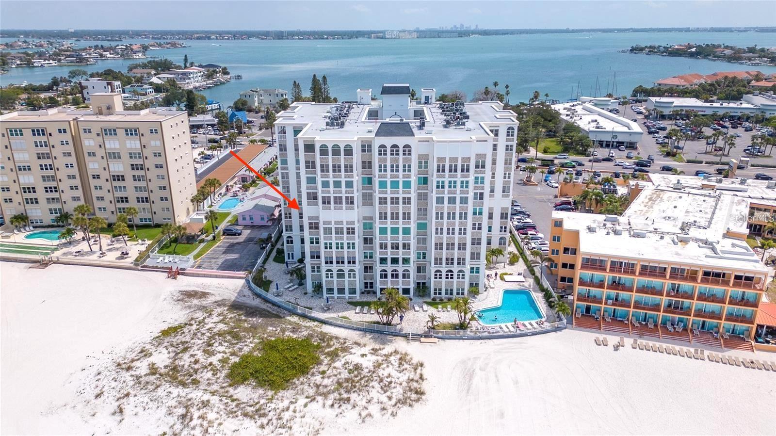 Conventional Financing Available - Don't miss this opportunity to own one of the most highly sought-after Condo units on the beautiful white powder sand beach on the Gulf at St. Pete Beach Florida at a reduced price. A rare opportunity to own this waterfront 2 bedroom 2 bath NW corner condo with beautiful Gulf views north to Clearwater and west as far as the eye can see. "Feet in the Sand". The Beau Monde provides a formal secured lobby entry, heated saltwater pool, exercise & weight room with sauna and showers, direct private beach access, tennis and pickleball courts, BBQ grills, and a club room, all complemented by the service of an on-site property manager. This unit includes a covered private parking space just outside of the main lobby entrance. Excellent location in the center of St. Pete Beach, across the street from Publix, Starbucks, CVS, shopping and many restaurants, convenient access to I-275 with close proximity to the vibrant downtowns of St. Petersburg and Tampa. Enjoy "Malio's Beach House" Steak House and "1200 Chop House" across the street and many other fine dining restaurants within walking distance. Only a short drive or walk to incredible dining, entertainment and world-class amenities. Or, simply walk out the door and plant your feet in the soft sand and the warm waters of the Gulf. Take relaxing strolls down quiet alleyways and experience the historic charm of Pass-A-Grille, a quaint seaside village just to the south with numerous shops, boutiques and restaurants. Just north, you'll find exciting Treasure Island & John's Pass. Only 20 minutes to downtown St. Petersburg and 30 minutes to Tampa, TPA, 20 minutes to PIE.