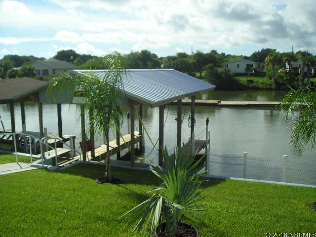 * BEST DEAL ON DIRECT DEEP WATER!!  WIDE CANAL , MOVE IN READY HOME*  TOTAL REMODEL 2015NEW ROOF, A/C,  CEILINGS,  FLOORS,  APPLIANCES,  PATIO & PORCH, SHED, WINDOWS AND DOORS!!         NEW BOAT DOCK & LIFT - LOCATION IS AWESOME SEE MANATEES PLAY FROM YOUR LIVING ROOM, DINING AREA AND KITCHEN .   WALK DOWN TO YOUR BOAT AND DRIVE OUT TO INTRACOASTAL WATERWAY IN A FEW SHORT MINUTES!! ;Water: City