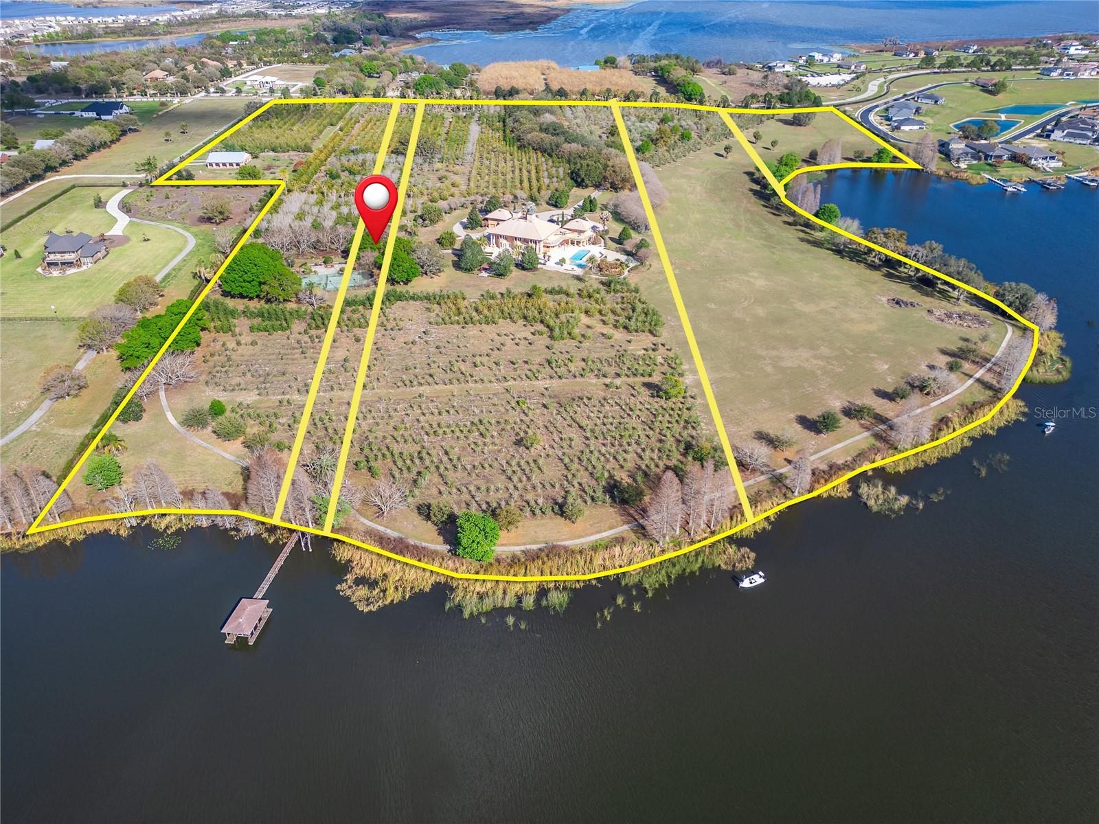 Rarely does an opportunity like this come to market. Tucked along the pristine shoreline of Lake Van in the heart of Auburndale, this 2.31 acres of lakefront parcel on Adams Barn Road is being sold with two options to either combine with above parcel or below parcel to build the private estate you've always envisioned, completely on your own terms. Lake Van spans 595 acres and reaches depths of up to 30 feet, offering spectacular open-water views and year-round recreation. The lake welcomes motorized boats, jet skis, and houseboats with no permit required and no boating restrictions, making it a true lakefront lifestyle destination. With this much acreage directly on the water, you'll have the room and the privacy to design a home that takes full advantage of every breathtaking sunset over the lake. Towering trees, lush natural surroundings, and direct lake frontage create an atmosphere of seclusion that is increasingly rare in Central Florida, a true private retreat where the outside world simply fades away. Auburndale sits in Polk County, the true center of Florida, equidistant from the Gulf and Atlantic, and between Tampa and Orlando. You're just 44 miles from Orlando and only 30 to 40 minutes from Walt Disney World, Universal Studios, and SeaWorld, yet here on Adams Barn Road, you'll feel a world away. The city is ringed by more than a dozen lakes, and its relaxed, small-town character makes it one of Central Florida's most beloved hidden gems. This is one of several available parcels in this exceptional lakefront enclave. An additional 12.59acres adjacent parcel is available separately, ideal for expanding your estate, ensuring maximum privacy, or securing the land for family. Opportunities to own this much pristine lakefront acreage on Lake Van simply do not come along often. Whether you're dreaming of a grand estate, a weekend escape, or a generational legacy property, this is where that dream begins.