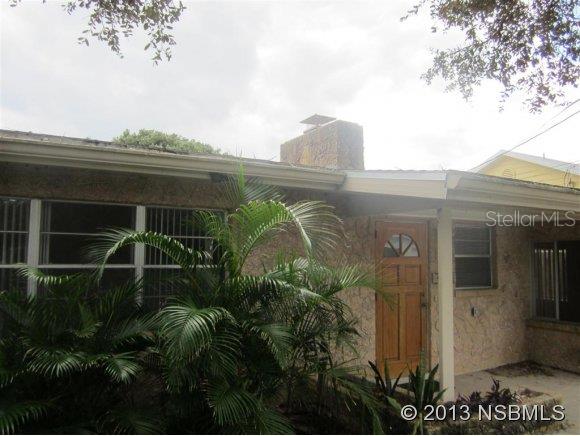 The home has the perfect location offering an easy walk to The Beach and Flagler Avenue. Bonus Room could be third bedroom. Vaulted ceiling in living room. New Refrigerator(Oct 2013). Newer AC (2011). Newer Hot water heater (2012). Washer and dryer included. Terrazzo floors throughout except for carpet in bonus room. Wood-burning fireplace.