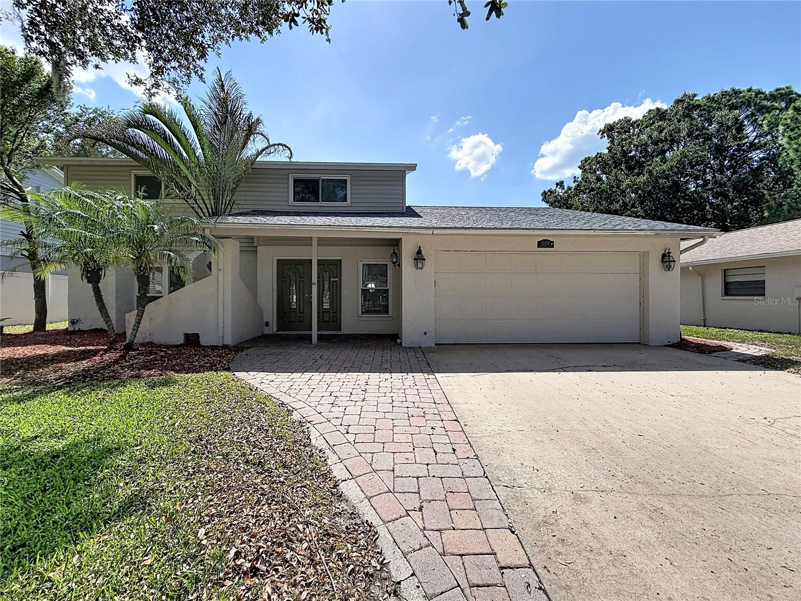 CARROLLWOOD AREA – Located in the desirable Gaither High School district, this updated 4-bedroom, 2.5-bath, 2-car garage pool home sits on a quiet cul-de-sac. Major improvements include a new roof (May 2018) and energy-efficient dual-pane windows.

A brick paver double-door entry enhances curb appeal and opens to a welcoming foyer with beautiful flooring throughout the home. The living and dining room combination, accented with crown molding, provides an ideal space for entertaining. The updated kitchen features stone countertops, wood cabinetry, center island, stainless sink, and upgraded lighting, all overlooking the spacious family room with vaulted ceilings.

Enjoy outdoor living year-round on the covered and screened lanai, with beautiful views of the pool. The fully fenced backyard offers privacy and space for pets or play. Conveniently located just steps from the community park with playground, and minutes from highways and shopping. Schedule your showing today!