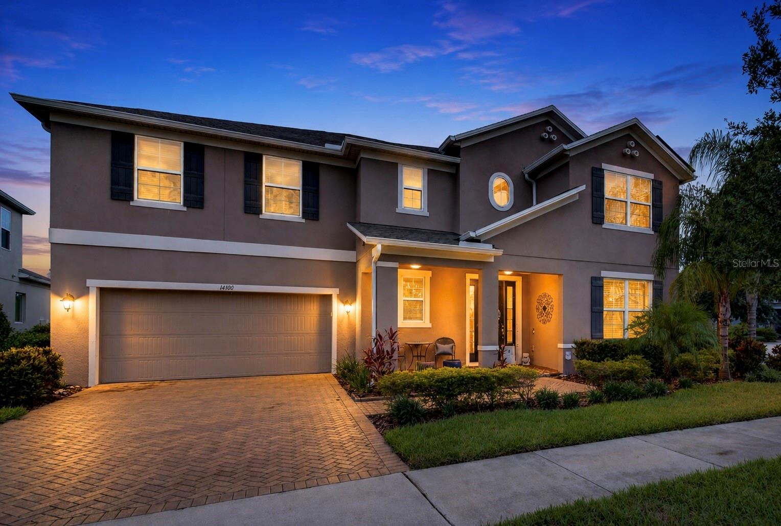 Virtually Staged. Beautifully maintained 5-bedroom, 3.5-bath home with over 4,000 square feet in the highly sought-after Orchard Hills community. Situated on a spacious corner lot, this home offers an ideal floor plan with the primary suite on the first floor and expansive living spaces designed for both everyday living and entertaining.

The gourmet kitchen features stainless steel appliances, double wall ovens, an oversized center island, abundant cabinetry, a butler’s pantry, and a large walk-in pantry, all overlooking the open family room and screened lanai.

This home is loaded with valuable upgrades, including a SOLAR energy system that helps keep electric costs exceptionally low, with most monthly electric bills averaging around just $33. Additional improvements include a HYBRID energy-efficient water heater, a Pelican whole-house WATER FILTRATION system, and CUSTOM his-and-hers walk-in closets in the primary suite. There is NO CARPET throughout the home, with luxury vinyl plank flooring covering the entire second floor for a modern, low-maintenance finish.

The spacious first-floor primary suite offers a private retreat with dual custom walk-in closets and an elegant en-suite bath featuring dual vanities, a makeup station, an oversized walk-in shower, and a soaking tub. Upstairs, you’ll find four additional bedrooms, two full bathrooms, a large loft, and a separate bonus/media room, providing flexible space for family, guests, or working from home. The back yard is fully fenced and plenty of room for a pool.

Residents of Orchard Hills enjoy resort-style amenities including a community pool, fitness center, clubhouse, playground, dog park, and walking trails with the pool and clubhouse being a couple of minutes walk. The home is zoned for highly rated schools and is conveniently located just minutes from Walt Disney World, the rapidly growing Hamlin Town Center, shopping, dining, and entertainment. With easy access to SR 429, the Florida Turnpike, and SR 408, commuting is simple, and Orlando International Airport is within easy reach. Combining energy efficiency, extensive upgrades, generous living space, and an exceptional location, this home is truly move-in ready.