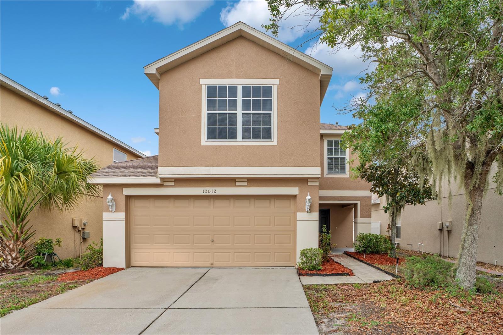 Move-in-ready and packed with major updates, this 3-bedroom, 2.5-bath two-story with a versatile upstairs loft in Gibsonton's South Bay Lakes community comes with up to $13,383 toward buyer closing costs, prepaid expenses, and/or an interest-rate buydown when using the Seller's preferred lender, subject to lender approval, loan-program restrictions, and the terms outlined in the executed contract. A brand-new HVAC system and a new roof (scheduled, pending final HOA approval) deliver lasting peace of mind, while fresh interior paint throughout, updated lighting and fixtures, and a clean cosmetic refresh make it ready for its next owner from day one. Downstairs, the open kitchen flows to a spacious family room and out to a covered, screened patio overlooking the fully fenced backyard—ideal for relaxing or entertaining year-round. Upstairs, the generous primary suite offers a private ensuite bath and walk-in closet, joined by two additional bedrooms, a second full bath, and a flexible loft that works as a home office, playroom, media room, or second living area. With a two-car garage, interior laundry room, and no CDD, this home pairs space and function with a convenient Gibsonton location—minutes from US-41 and I-75, shopping, dining, and an easy commute to Tampa, Brandon, MacDill AFB, and the Gulf beaches. Tour every room with the immersive 3D virtual tour, then book your private showing.