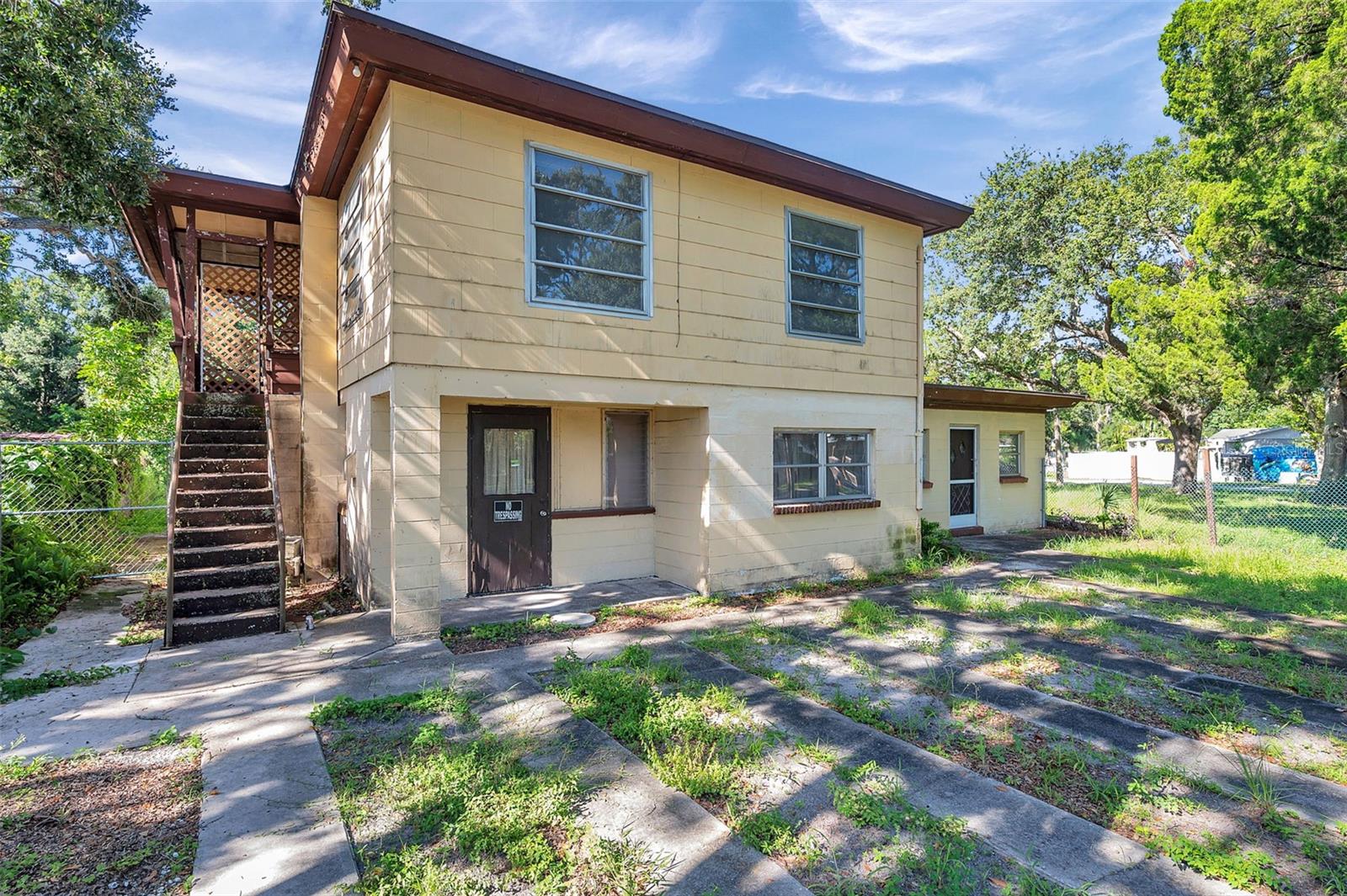 Rare 6-unit value-add opportunity in unincorporated St. Petersburg. Situated on a spacious 0.27-acre lot, 7180 50th Ave N is a concrete block multifamily property with significant renovation needs and serious upside for the right investor, contractor, or developer.
The property is currently configured as 6 units, offering multiple paths for future rental income, owner-occupancy, house hacking, or long-term portfolio growth once renovated. This is not a cosmetic project — the property is a complete fixer and should be evaluated accordingly.
The lot size, existing unit configuration, block construction, and central Pinellas location make this a compelling repositioning opportunity. Buyers may also explore future expansion, redevelopment, or alternative use possibilities, subject to county approval, zoning, permitting, and due diligence.
Located in unincorporated Pinellas County near major roads, shopping, dining, and Gulf Coast destinations, this property offers flexibility that is increasingly difficult to find. Sold as-is. Buyer to verify all measurements, unit count, zoning, permits, code compliance, flood zone, rental use, redevelopment options, and future income potential.