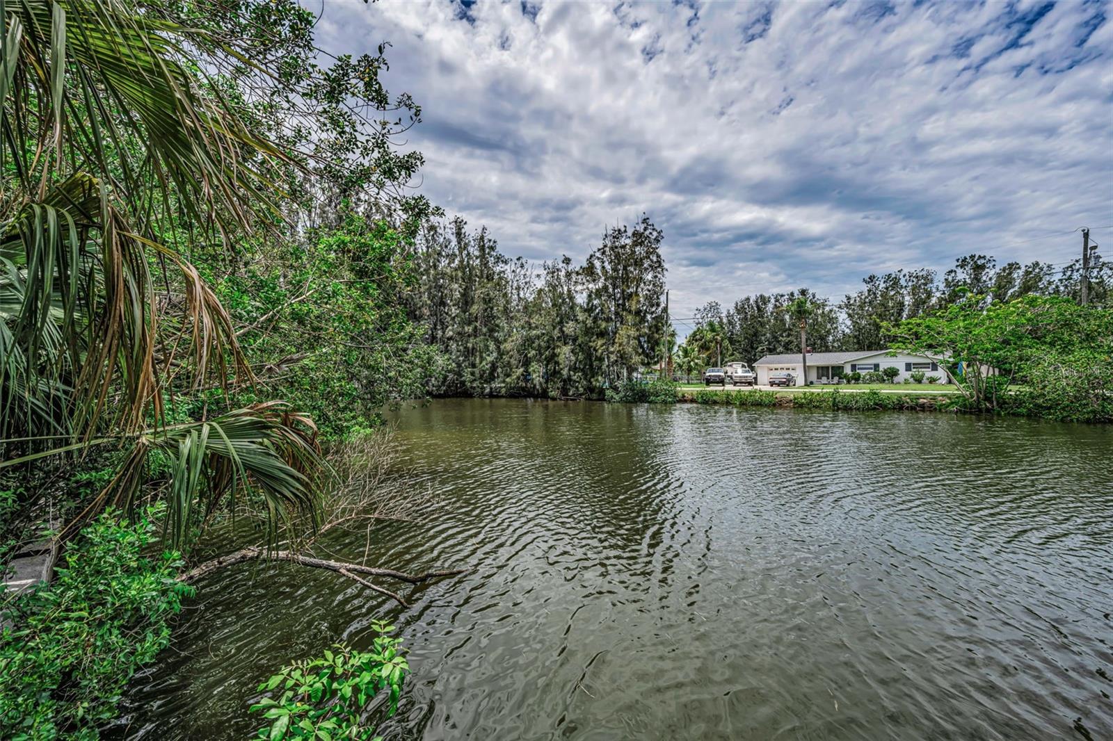 Exceptional Waterfront Homesite with Direct Gulf Access!

Build the waterfront home you’ve always envisioned on this outstanding property located in the desirable Pine Island Estates community. 

One of the property’s most unique features is the unspoiled natural setting. With protected marshland and county-owned property across the canal, you’ll enjoy peaceful water views, added privacy, and very few neighboring homes. Wildlife is abundant, with frequent visits from dolphins, manatees, blue herons, egrets, osprey, cormorants, and even bald eagles, creating a true Florida Nature Coast experience.

Spend your days fishing or crabbing from your own dock, or launch your kayak, paddleboard, jet ski, or boat for a scenic ride through the canals to the Gulf of America. Along the way, you’ll often encounter Florida’s incredible marine life before reaching open water, where world-class fishing, boating, island hopping, and spectacular sunsets await.


Convenience is another major advantage of this location. Port Hudson Marina and Get Hooked Bar & Grill are just a short walk away, while Sam’s Beach Bar, Inn on the Gulf, SunWest Park & Beach, grocery stores, medical facilities, and everyday shopping are only minutes away. Tampa International Airport is approximately 45 minutes away, providing easy access for travel while allowing you to enjoy the peaceful charm of Florida’s Nature Coast.