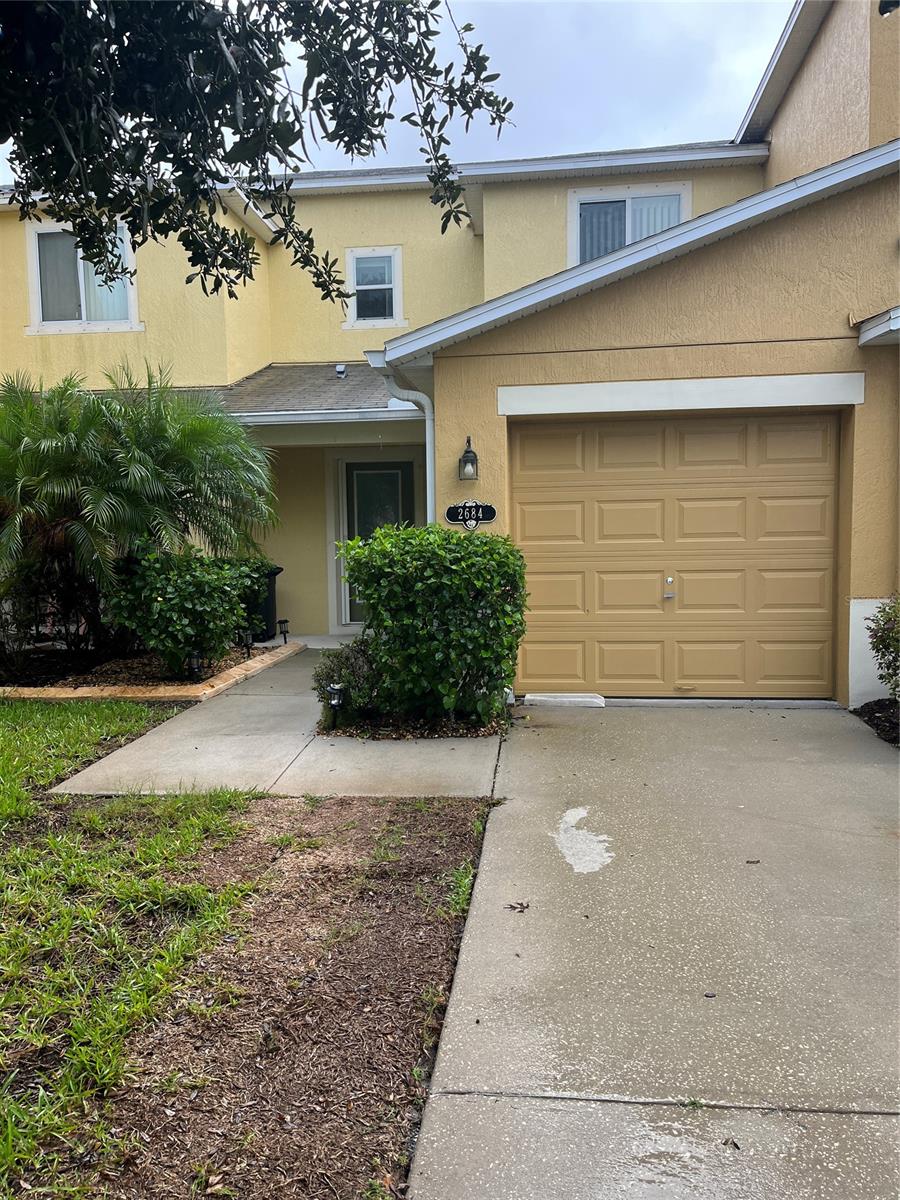 UPDATED! Beautiful 2 bedroom / 2.5 bath townhouse located in The Landings At Sugar Mill . This home has been updated to include luxury laminate flooring throughout, new refrigerator, fresh paint and a new AC unit.  This home features a screend lanai off the living room to enjoy the evening breeze. The Landings at Sugar Mill is A serene community with tree-covered sidewalks and beautiful views of the lake. The community has a beautiful pool and clubhouse for your enjoyment! Close to I-95, shopping, the beach and numerous restaurants.  Come take a look, you won't be disappointed! ;CleaningFee: 150