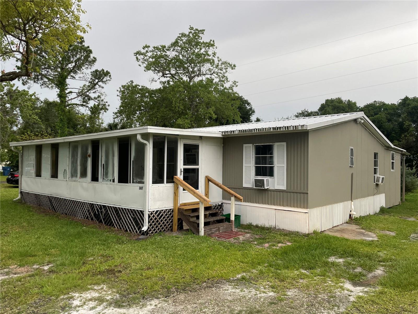 Fresh paint and New flooring throughout this 3 bedroom 2 bath Split floor plan home. New cabinets in the Kitchen. Indoor laundry area has a rear entrance and can also be accessed from the kitchen. Enclosed Porch converted into a Bonus room that features a closet and office/den. Large back yard, additional storage building. Schedule your private showing today!
