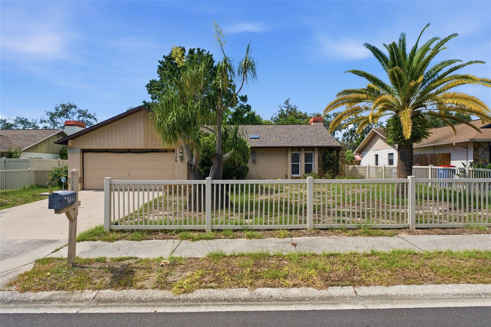 Enjoy the Florida lifestyle in this spacious 2-bedroom, 2-bath pool home offering a comfortable layout, thoughtful updates, and the opportunity to add your own finishing touch. With a new roof, updated windows, and luxury vinyl plank flooring throughout much of the home, many of the major improvements have already been completed, giving the next owner peace of mind for years to come.
Inside, the split-bedroom floor plan offers privacy for owners and guests, while the spacious living room features vaulted ceilings, a beautiful stone fireplace, and sliding glass doors leading to the screened pool and lanai. The kitchen overlooks the main living area and connects to both a breakfast nook and a separate dining space, creating a layout that's comfortable for everyday living and entertaining alike.
The primary suite offers a walk-in closet and private bath with dual vanities and a walk-in shower, while the guest bedroom and bath are tucked away on the opposite side of the home. The bedrooms have been intentionally left ready for the new owner's choice of flooring, and to help make the home your own, the seller is offering a $5,000 credit toward new flooring so you can choose the style that best fits your taste.
Step outside and enjoy the screened pool, spacious fenced backyard, and detached storage shed that's perfect for hobbies, gardening equipment, or additional storage. Whether you're spending the afternoon by the pool, hosting friends, or simply relaxing outdoors, there's plenty of room to enjoy Florida living.
With a two-car garage, mature landscaping, major system updates already completed, and a seller credit that allows you to personalize the finishing touches, this home offers a wonderful combination of comfort, value, and opportunity.