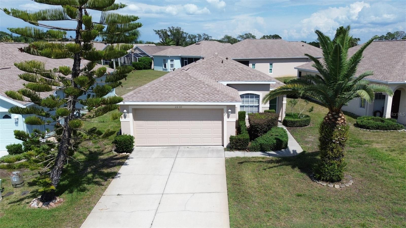 Imagine living just steps to the stunning waters edge of the Gulf, yet still in an X Flood Zone! Minutes to World Class Golf Courses, Venues for Concerts, Theater, Pro Sports, Casino, Museums, Water Sports, Marinas, Fishing Piers, Nature Parks, Biking/Jogging Trails, Fine/Causal Cuisine, 2 Airports! Welcome to the Seaside Community of Key Vista! This 55+ Single Family Residence has NO CDD Fees & LOW HOA Fees!!! Perched at the top of a Pond you can watch the Florida Sunrise over the water while having your morning coffee in the Screen Enclosed Patio Room. This is a  sanctuary-like setting where Birds & Aquatic Life abound! Enter the home into the Foyer and notice immediately how the Cathedral Ceilings make this Residence ideal for entertaining with it's Open Concept, Great Room layout! There is a Double-Door Entry Flex Room that can easily be used for a 3rd Bedroom, Office, Den. The Kitchen has newer SS Appliances, Wood Cabinetry, Sold Surface Countertops and High Bar Seating for 4! The Owners Retreat is SUPER Large complete with an EnSuite with Double-Size Shower, Double Undermount Sinks with Solid Surface Countertops and an EXTRA large Walk-In Closet! The Guest Quarters with it's own Guest bath and Indoor Laundry is just behind the Tall Sliding Door System installed for added privacy. This Split Floor Plan is ideal for shared living and will always be in high demand! The LOW HOA Fees include care of Lawn, Shrubs, Lower Height Trees with Sprinklers monitored, Exterior Painting every few years (done recently) & Internet & Streaming with many Premium Channels all included! The amenities are UNRIVALED in this West Pasco Waterside Area! The Vista Point Subdivision features its own 55+ Clubhouse, Heated/Cooled Pool & Spa & an ample size open as well as Covered Patio, a Kitchen, Party/Rec Room & a Pool Table Room w/Library. The All-Ages Clubhouse features a Huge Heated/Cooled Pool & Spa area with Open & Covered Patio, Kitchen, Party/Rec Room, Game Room w/Pool Tables, Ping Pong & Card Tables, Fitness//Workout Center with Locker Rooms & Showers & a Yoga Room. There are Tennis/Pickleball Courts, Volleyball Court & Playground. Partake in Activities such as Block Parties, Garage Sales, Yoga, Aqua Bellies, Line Dancing, Bingo, Holiday Home Decorating Contests & Golf Cart Parades! We even have Food Truck days, Happy Hour get-togethers, Potluck Dinners & the occasional Pub Crawls & Golf Outings! RV & Boat Parking & the Boat Launch is right down the road. Outside the Back Gates is Key Vista Nature Park w/Hiking Trails, Anclote Gulf Park w/its super long Fishing Pier & Kayak Launch, Doggie Park & Playground and the Anclote River Park w/White Sand Beach, Boat Launches, Day Dock w/Slips & Playground. Holiday Rec Center right next to KV offers a Baseball Field, Basketball Courts, Hockey Field, Pickleball, Waking & Jogging areas and many scheduled Classes & Events. Biking/Jogging/Walking Path is just outside our Back Gates. Re-Roof 2025, HVAC 2024, WH 2023, Refrig 2023, Stove 2022, MW 2024, DW New, W & D New!!! Need Furniture? It is being sold Almost Fully Furnished! All I can say now is…..Welcome to our Fantastic Florida Paradise!
