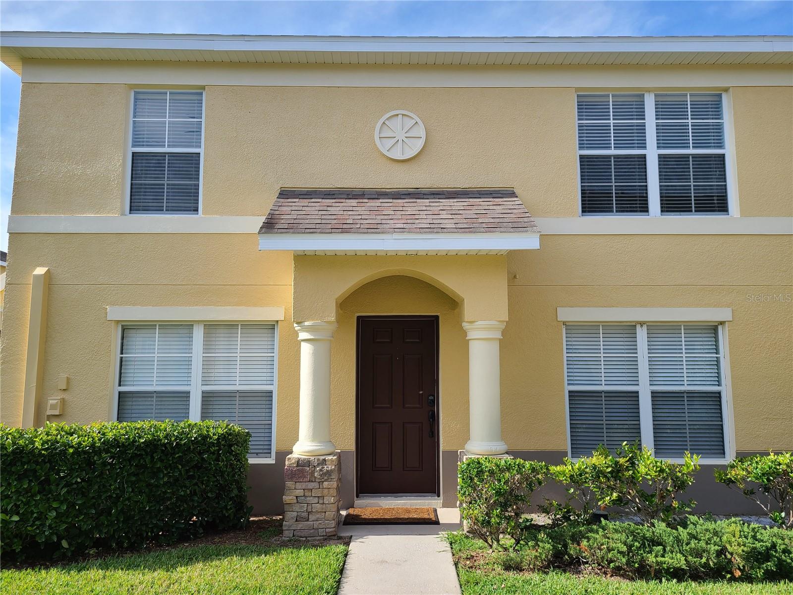 Welcome to this move-in ready 3-bedroom, 2.5-bath corner-unit condominium located in the desirable gated community of Cobblestone Landings. This well-maintained home offers an inviting open-concept layout, featuring a spacious living and dining room combination that creates a comfortable and functional main living area. The kitchen is equipped with stone countertops, stainless steel appliances, and ample cabinetry—providing both style and plenty of storage. Upstairs, the primary bedroom includes an ensuite bathroom with a tub/shower combination. Two additional bedrooms are thoughtfully positioned on opposite sides of the guest bathroom, offering privacy for family or guests. The laundry room is also conveniently located on the second floor. Cobblestone Landings is a gated community offering a refreshing community pool and private mailboxes. Ideally situated near major retailers, restaurants, and I-4, this location provides an easy commute to Orlando and Tampa. A fantastic opportunity for anyone seeking comfort, convenience, and low-maintenance living in a prime location.