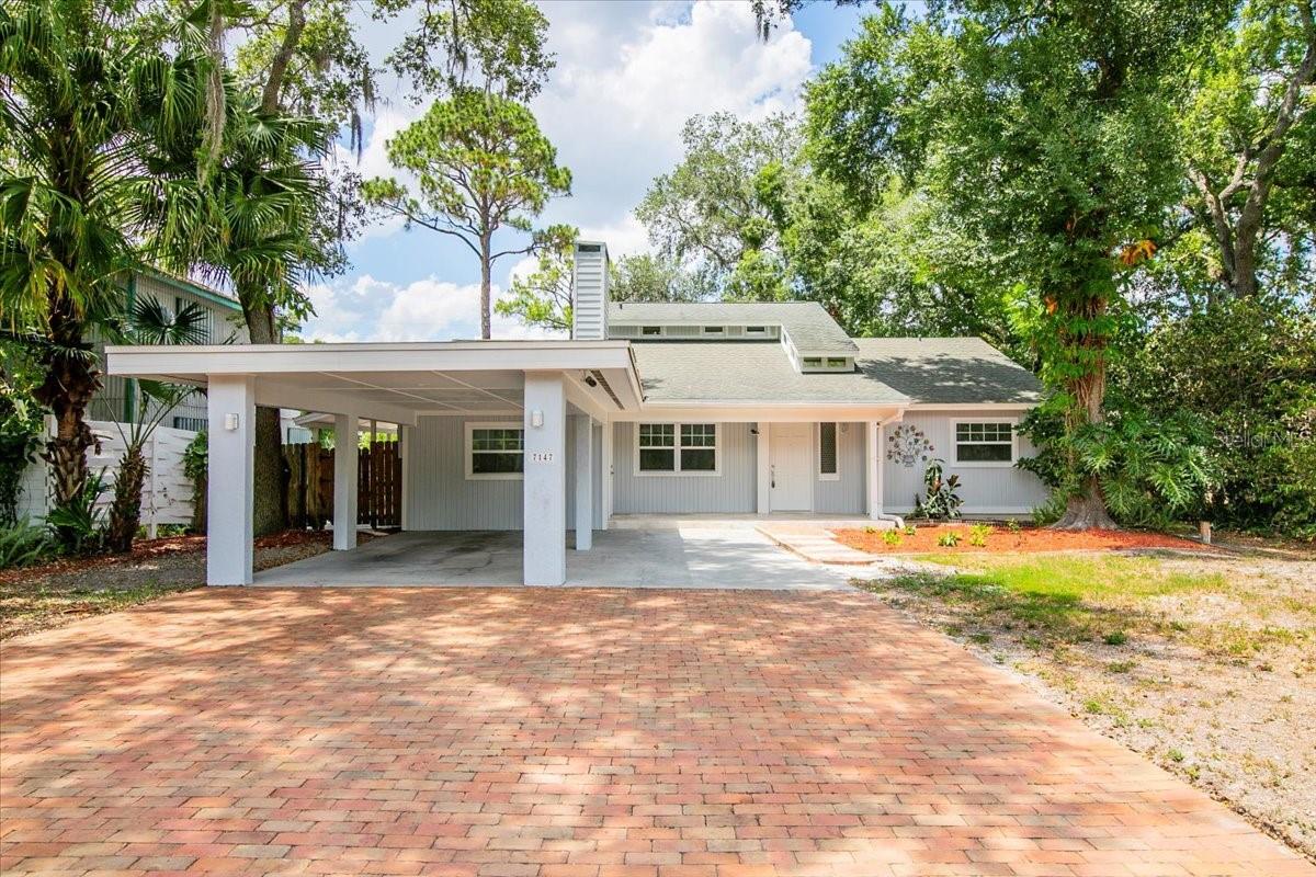 Lake Sarasota- Great Opportunity -Move-in Ready Home in Lake Sarasota  Includes 4 Bedrooms & 3 Full Bathrooms, Designed w/ a Split Bedroom plan that Offers Privacy & Convenience ~ all within  2056 A/C square feet of living area. This Home's Floor Plan, Provides Room for Guest/In-law or home office, Flex Room w/ separate entrance. Home has Mature Oak Trees & Landscaping, w/ Fenced Back Yard, Covered Carport w/ a Large Paver Driveway. The Primary Bedroom / Bathroom upstairs plus additional walk-in storage space in a walk-in Attic Area. !!!NEW ROOF in 2025!!!Easy access to Lakeview PAW PARK, a Sarasota County Park with amenities including Canoe/Kayak Launch, Dog-Friendly (leash required), Just Across the Street!. Very conveniently located to I-75, and near a variety of restaurants, Sarasota/Tampa airports, the University Town Center mall. Siesta Key Beaches just a short drive away. Come See this Great Home with and Make it Yours!!