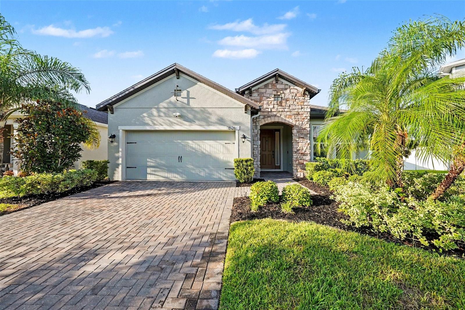 Virtually Staged. Welcome to 11526 Navel Orange Way, a rare opportunity to own one of the largest lots in the neighborhood, complete with a stunning private pool and plenty of space to enjoy Florida living at its best. This beautifully maintained 4-bedroom home offers a spacious and functional floor plan with the added luxury of two private en suites, making it ideal for multigenerational living, hosting guests, or creating a private retreat. Bedroom 3 and 4 share a Jack and Jill bath. Designed for both everyday comfort and effortless entertaining, the open-concept layout flows seamlessly throughout the main living areas. The kitchen features newer appliances and a kitchen island that overlooks the heart of the home, creating a welcoming space to gather with family and friends.
Step outside into your own oversized backyard oasis, overlooking the pond, featuring a screened-in pool with a brand-new screen and a new pump. Whether you’re enjoying a quiet morning coffee, relaxing after a long day, or entertaining guests, this oversized homesite provides the space and privacy you’ve been looking for. Additional upgrades include a new irrigation system and Tesla EV charger, offering modern convenience and added peace of mind.

Located in a desirable Westchase community with easy access to shopping, dining, parks, and major highways, this move-in-ready home combines location, lifestyle, and upgrades in one incredible package.

Don’t miss your chance to own one of the neighborhood’s standout properties. Schedule your private showing today!